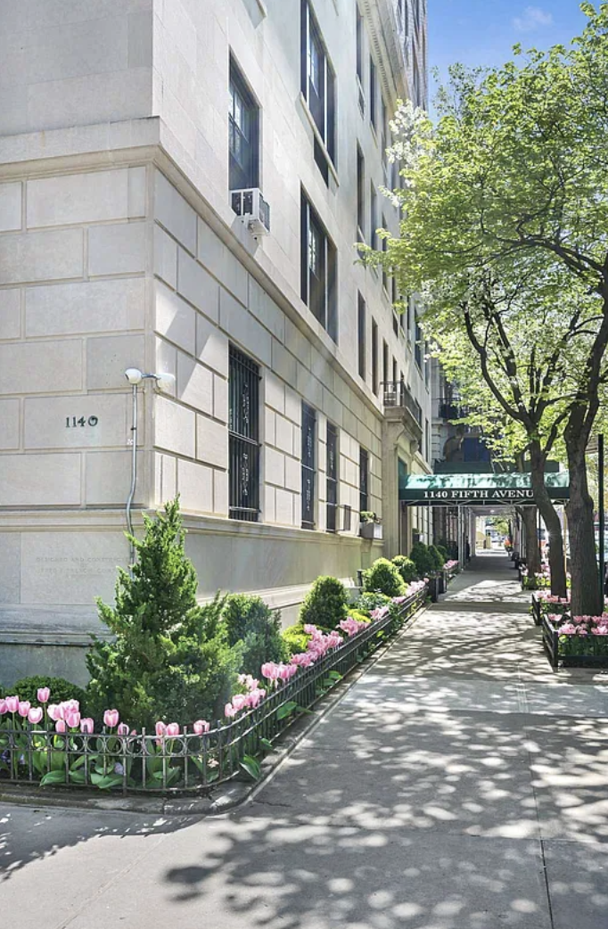 1140 5th Avenue, Unit 14B Manhattan, NY 10128 - Photo 17 of 18 a front view of a building with garden