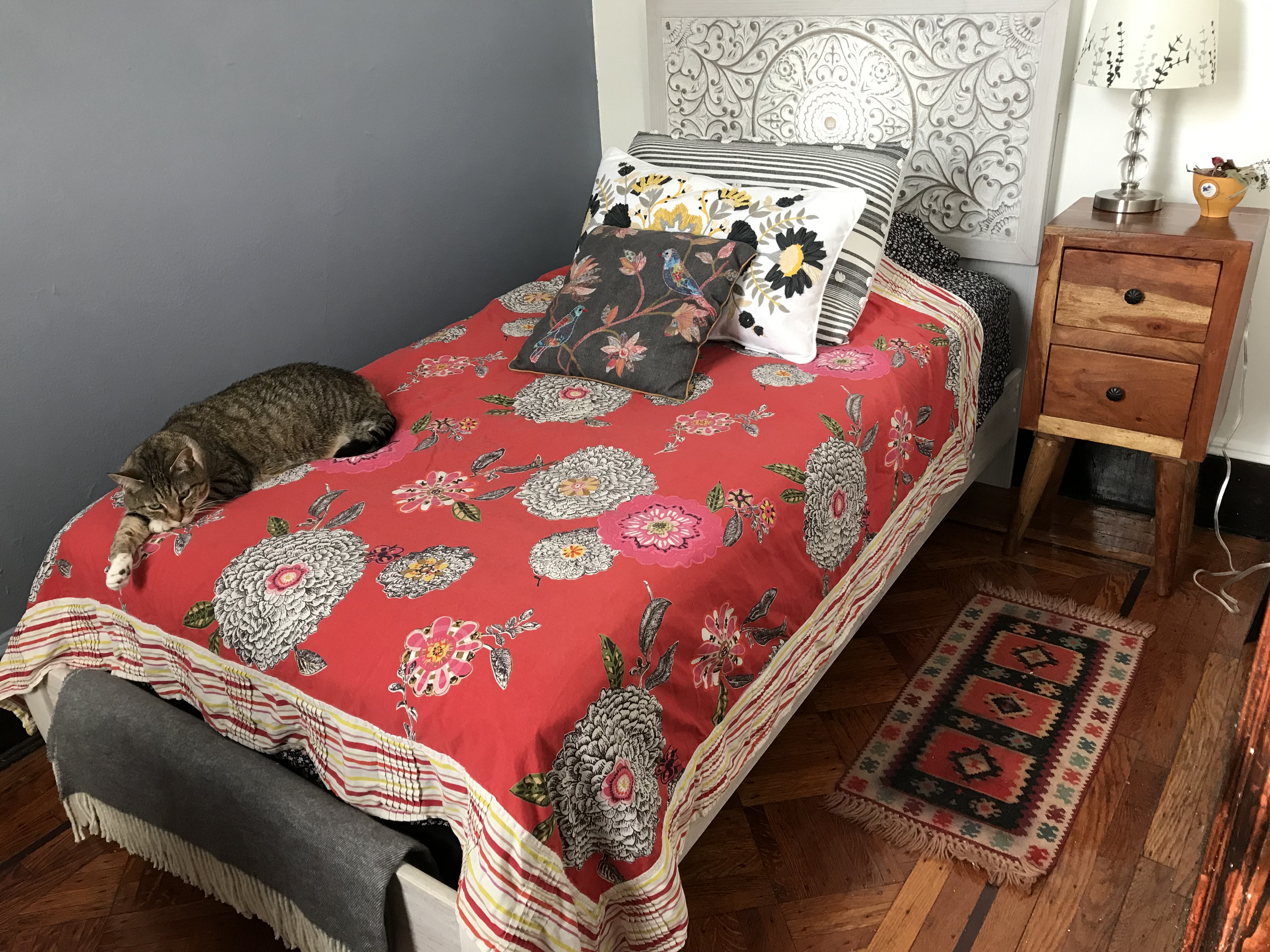 230 17th Street, Unit 2 Brooklyn, NY 11215 - Photo 16 of 16 a bed with a bed and a couch