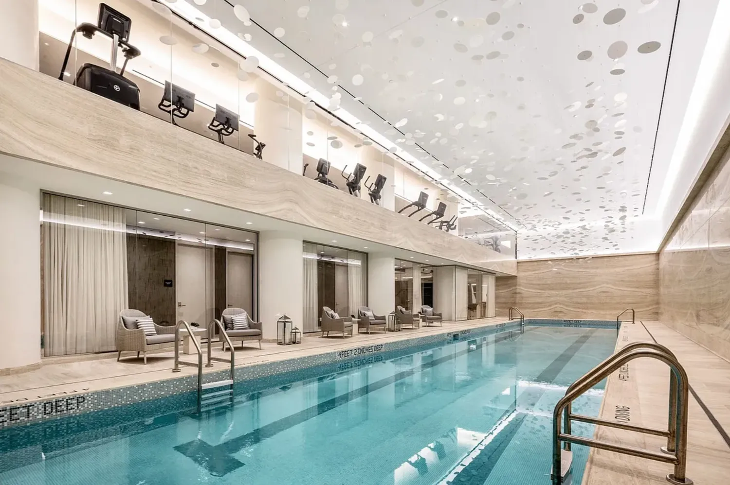 a view of swimming pool with outdoor seating