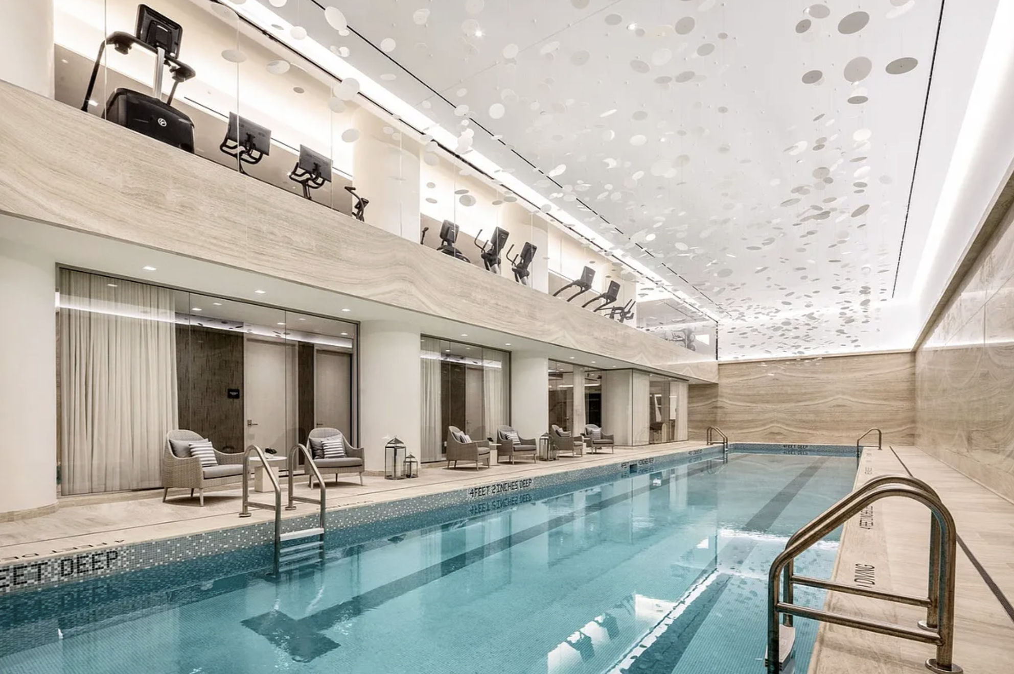 138 East 50th Street, Unit 40B Manhattan, NY 10022 - Photo 16 of 22 a view of swimming pool with outdoor seating