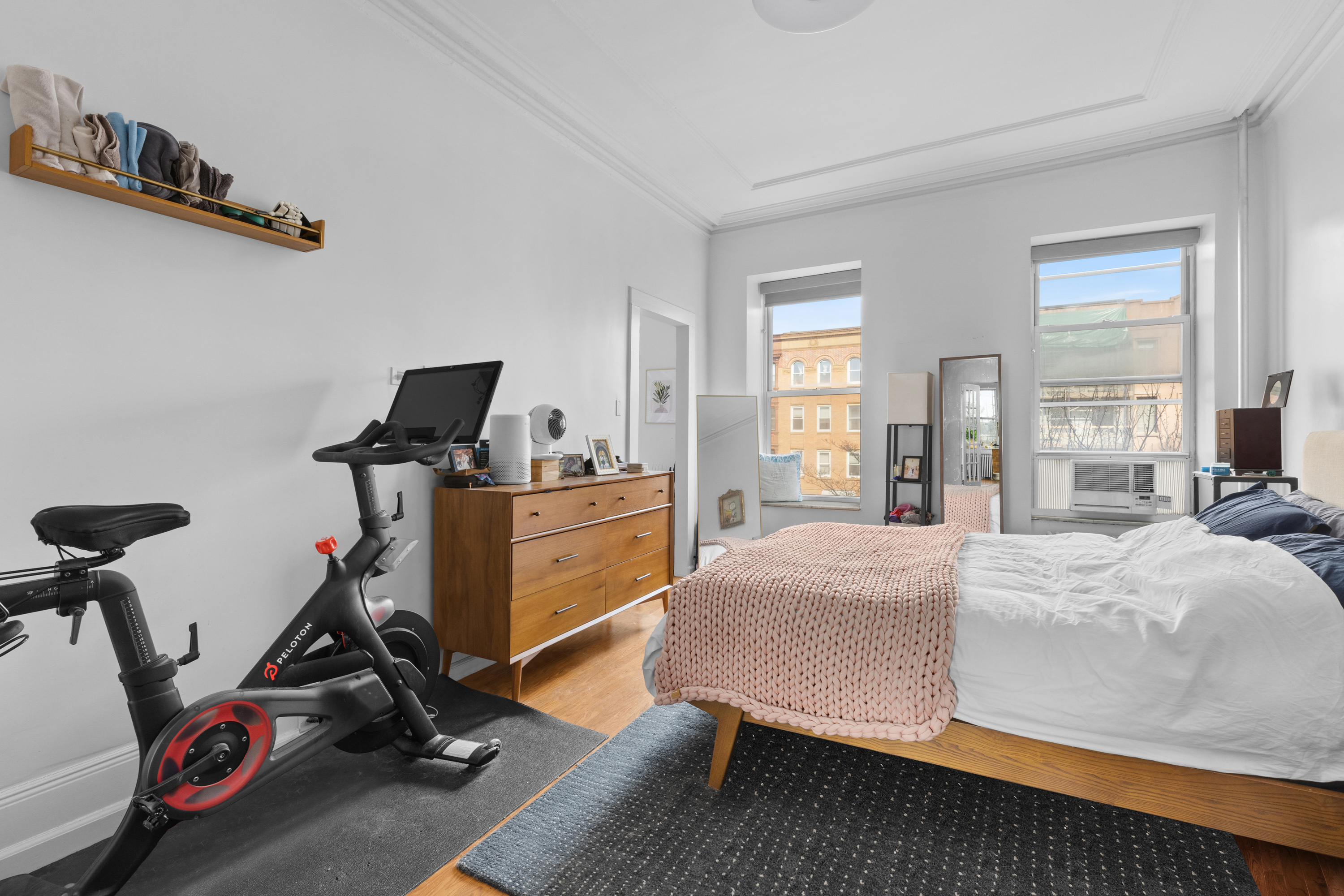 96 2nd Place Brooklyn, NY 11231 - Photo 8 of 14 a bedroom with furniture a air conditioner vent and a window