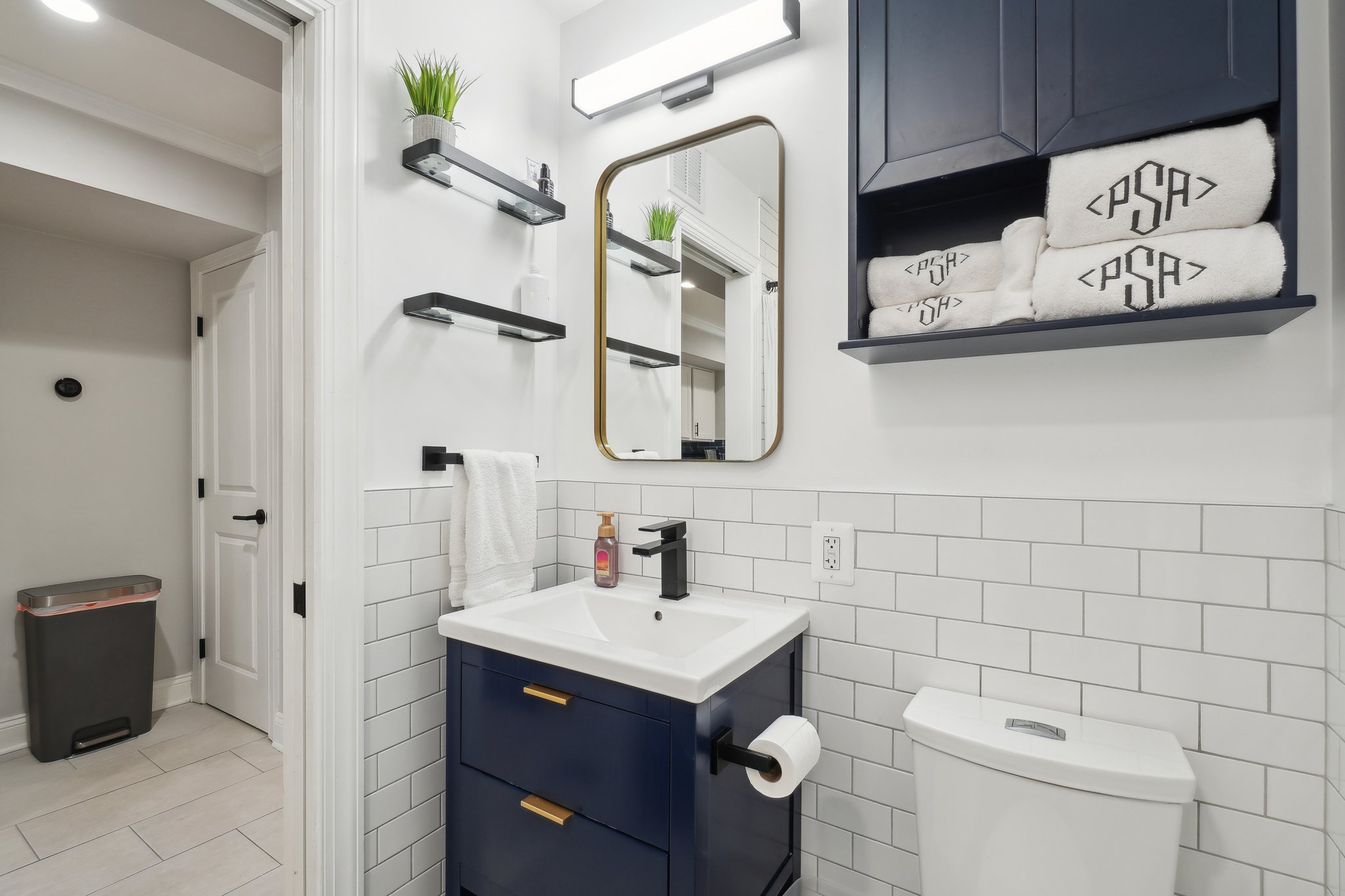 123 17th Street Southeast Washington, DC 20003 - Photo 15 of 18 a bathroom with a sink and a mirror