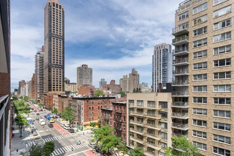 a city view with tall buildings