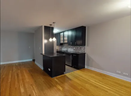 a view of kitchen and utility room