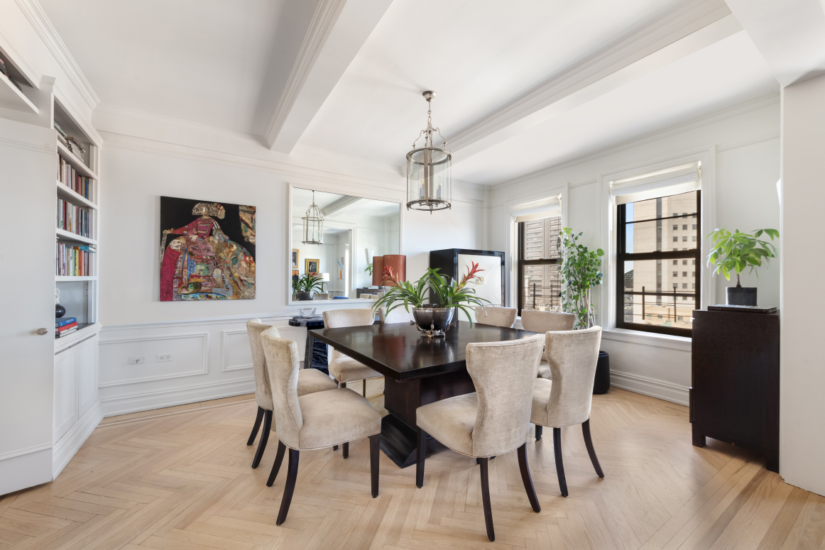 65 East 96th Street, Unit 15D Manhattan, NY 10128 - Photo 3 of 13 a view of a dining room with furniture window and wooden floor