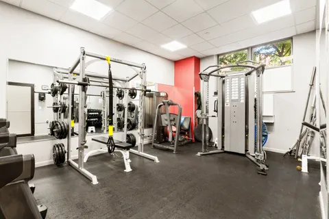 a view of a room with gym equipment