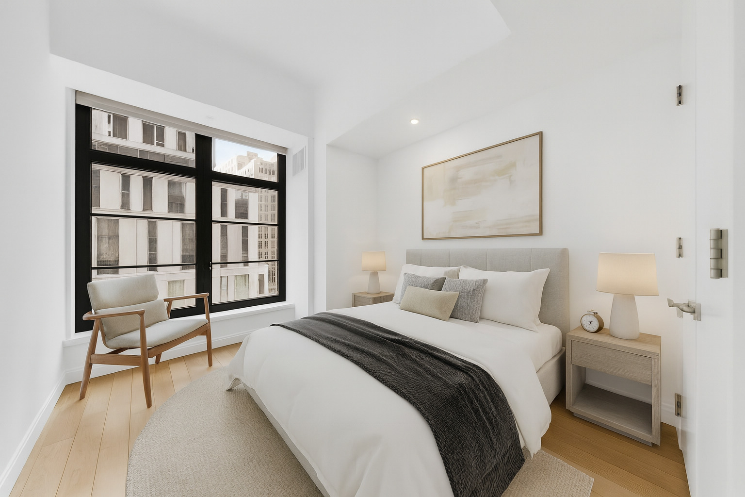 50 West 30th Street, Unit 3B Manhattan, NY 10001 - Photo 5 of 13 a bedroom with a bed and a window