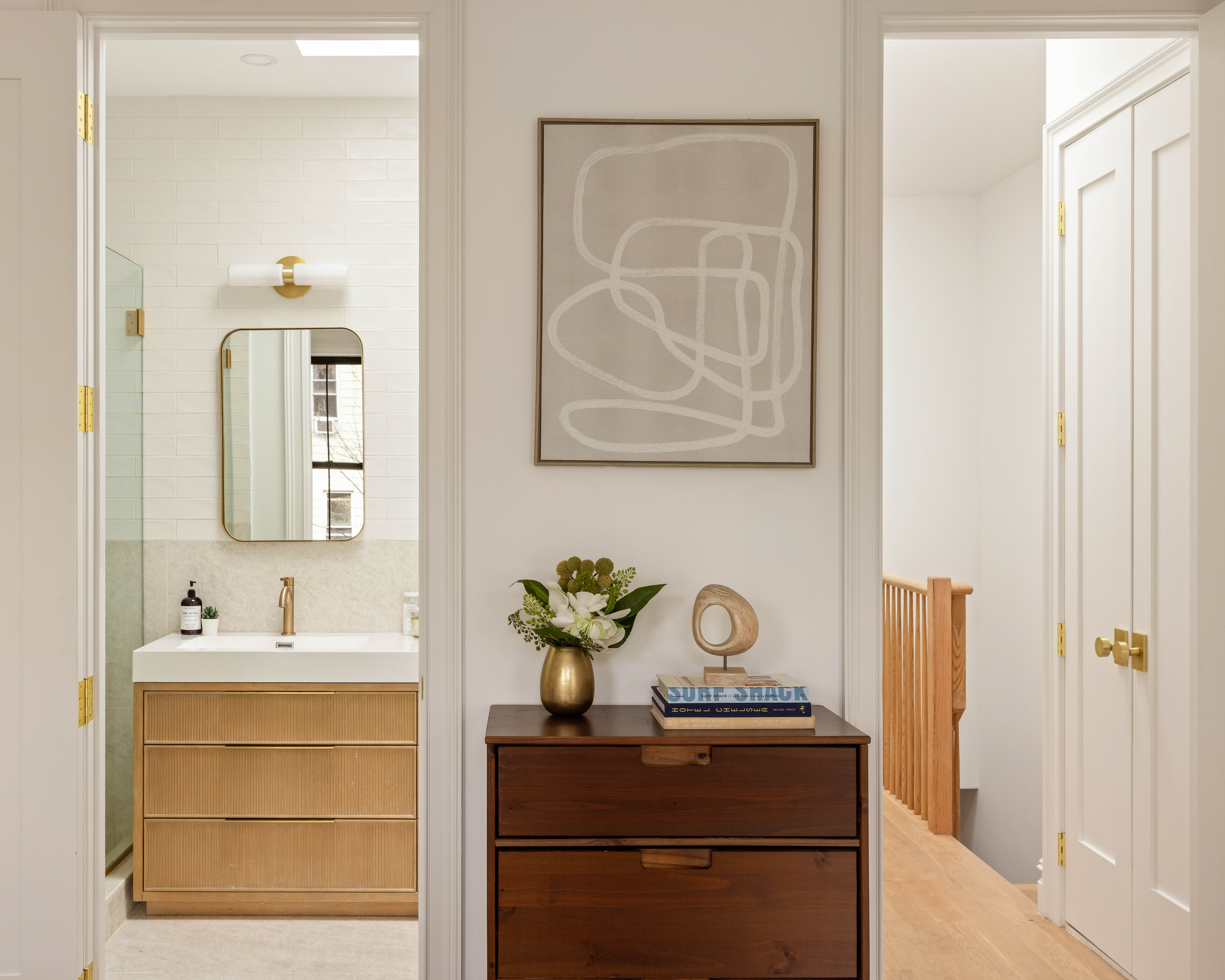 131 Weirfield Street Brooklyn, NY 11221 - Photo 7 of 14 a bathroom with a sink and a mirror