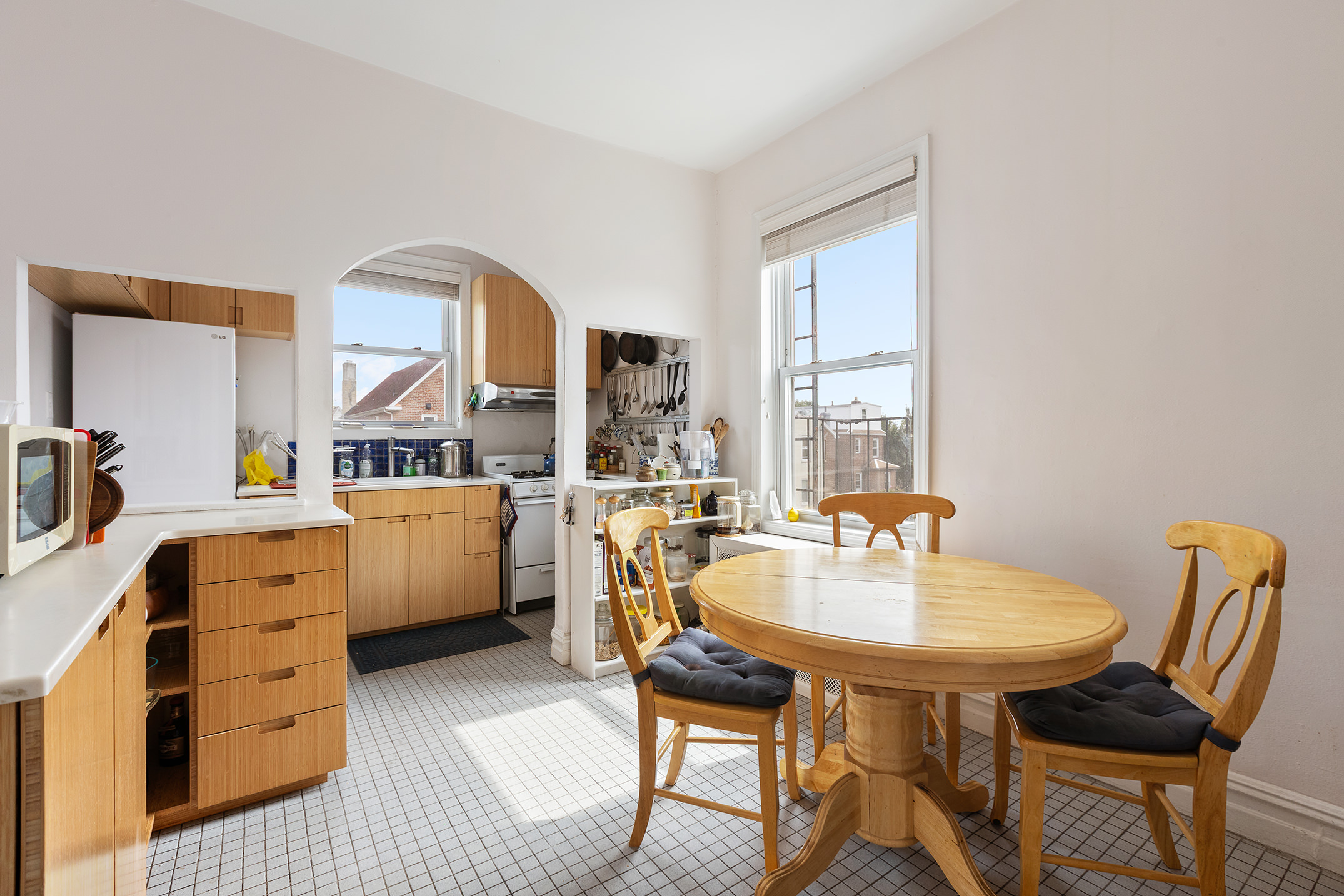 2536 Lurting Avenue Bronx, NY 10469 - Photo 16 of 27 a living room with furniture and a table