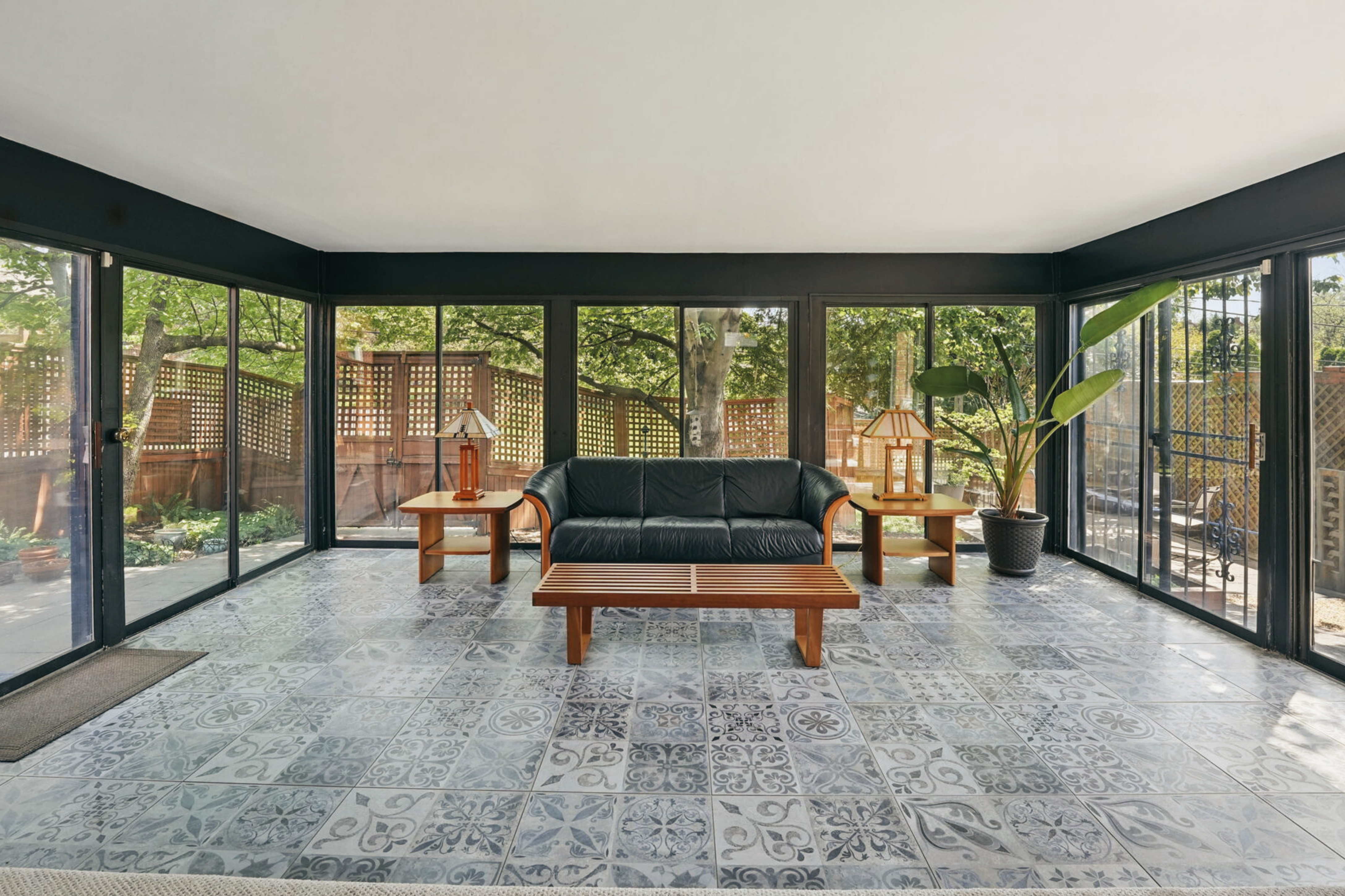 8003 16th Street Northwest Washington, DC 20012 - Photo 25 of 38 a living room with furniture and a floor to ceiling window
