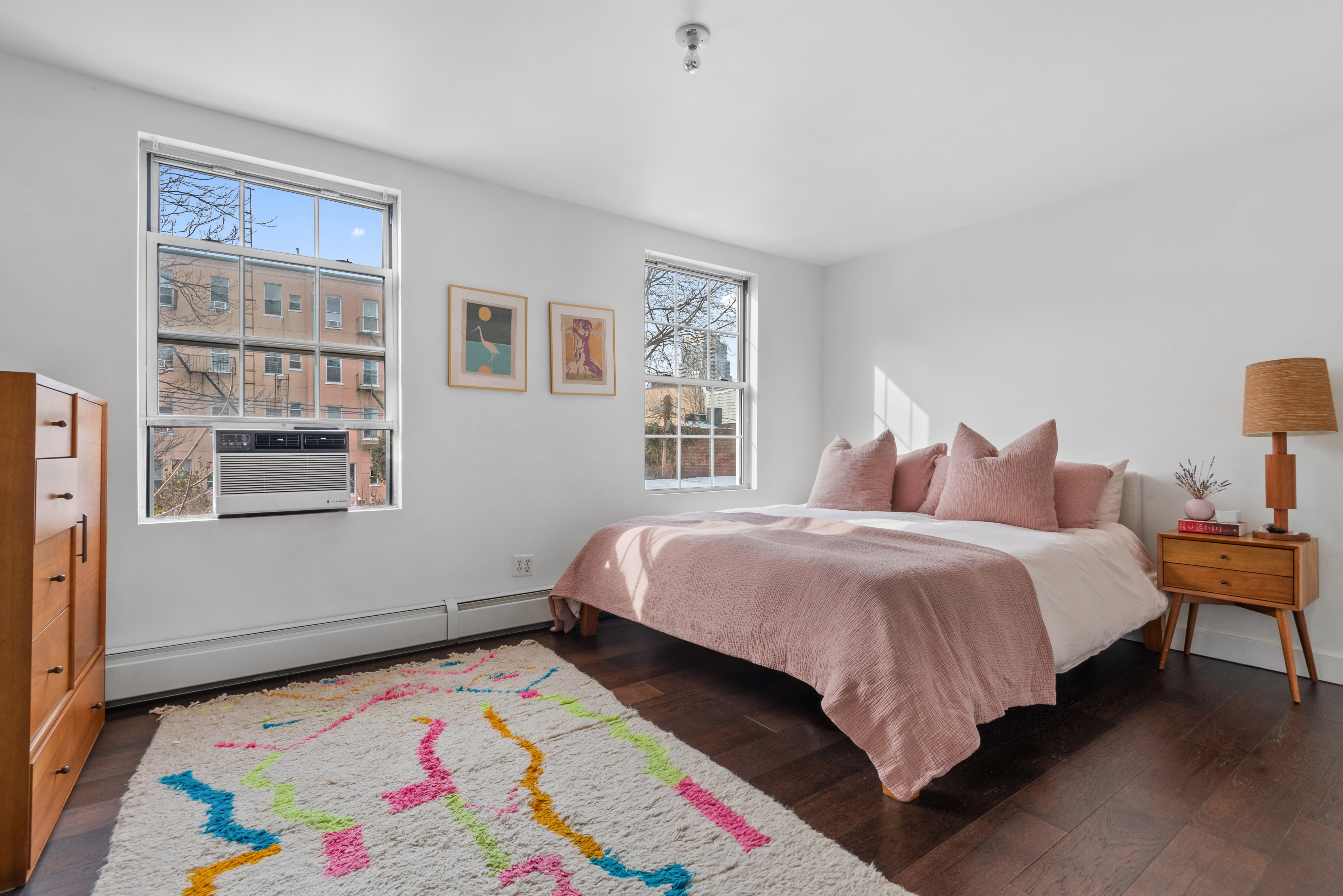 110 North 9th Street, Unit TH1 Brooklyn, NY 11249 - Photo 4 of 14 a bedroom with bed and a window