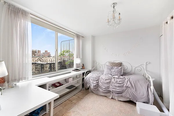 250 West 90th Street, Unit PH1E Manhattan, NY 10024 - Photo 5 of 13 a bedroom with furniture and a large window