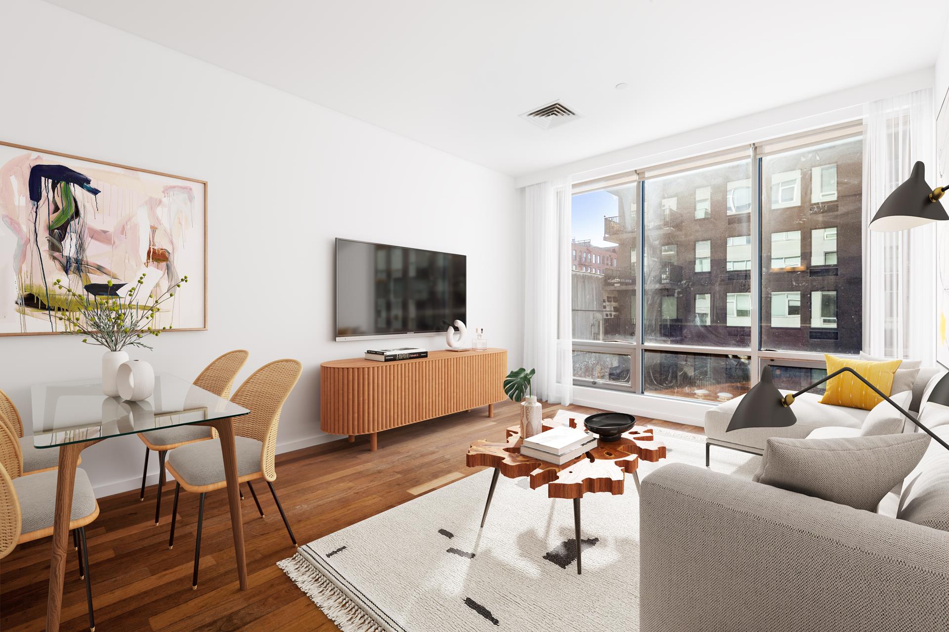 170 North 11th Street, Unit 3F Brooklyn, NY 11211 - Photo 1 of 9 a living room with furniture and a flat screen tv with wooden floor