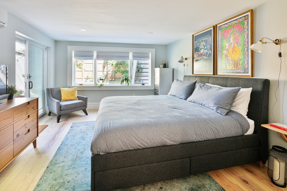 333 Prospect Avenue, Unit G Brooklyn, NY 11215 - Photo 4 of 8 a spacious bedroom with a bed a couch and dresser