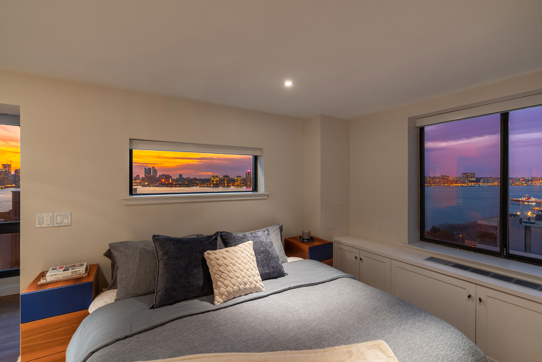 366 West 11th Street, Unit PHF Manhattan, NY 10014 - Photo 18 of 28 a living room with furniture and a flat screen tv