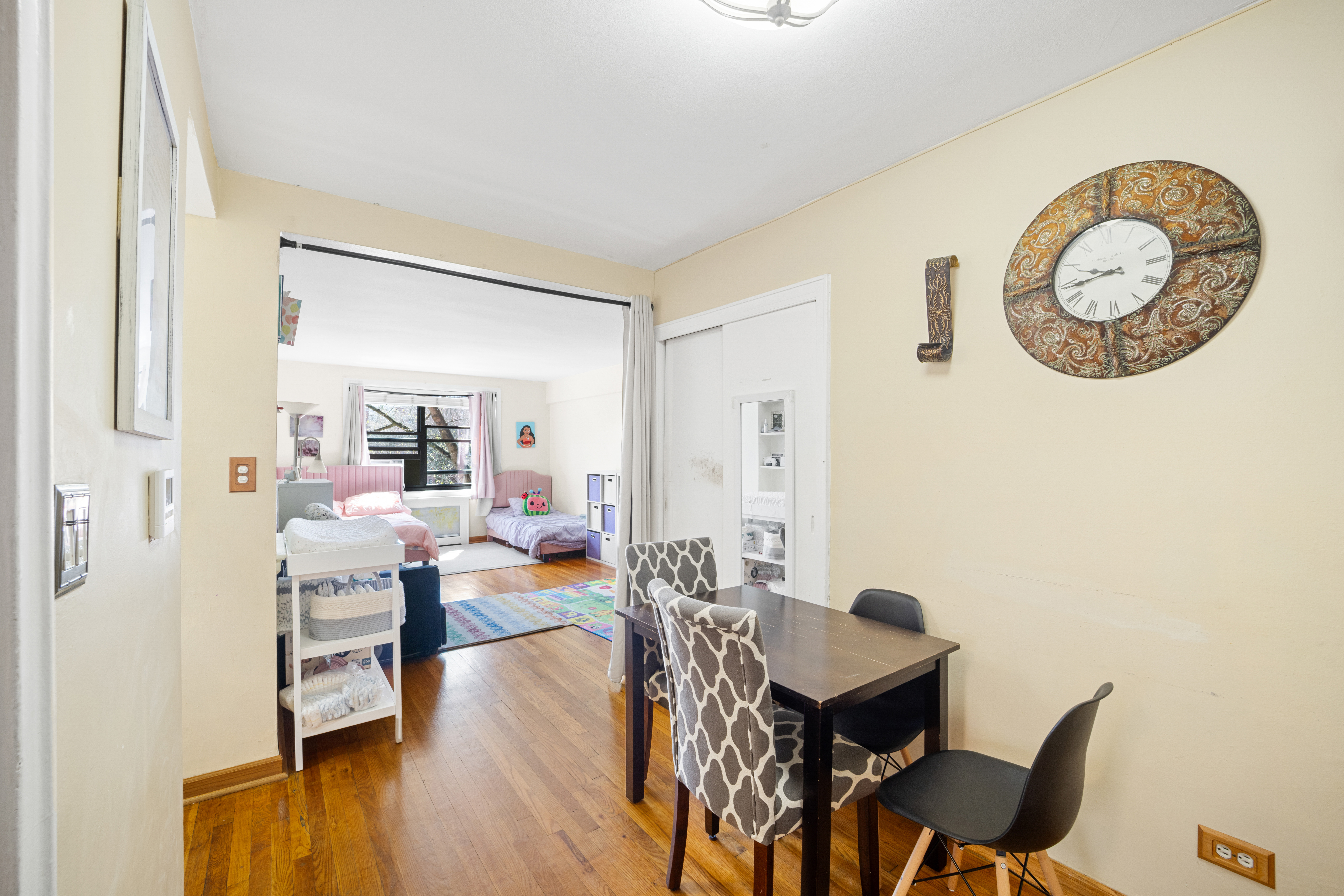 211-01 75th Avenue, Unit 4O Queens, NY 11364 - Photo 11 of 19 a view of a dining room with furniture and wooden floor
