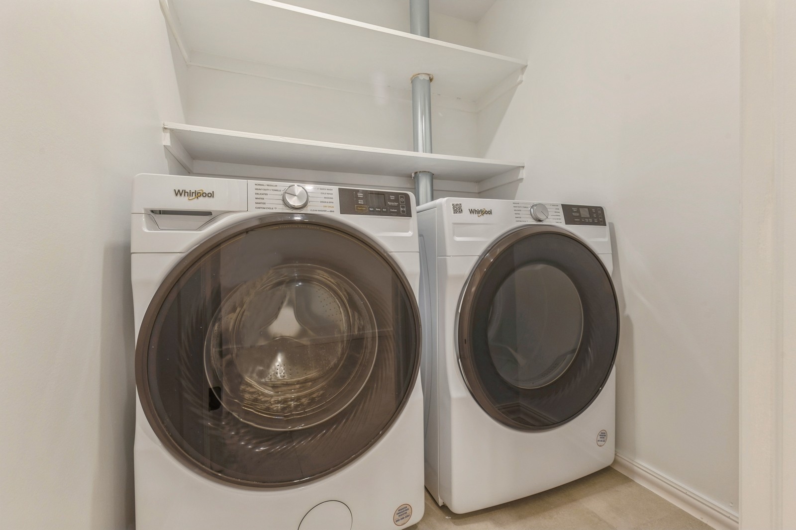11 Park Place, Unit 1 Brooklyn, NY 11217 - Photo 12 of 16 a utility room with dryer and washer