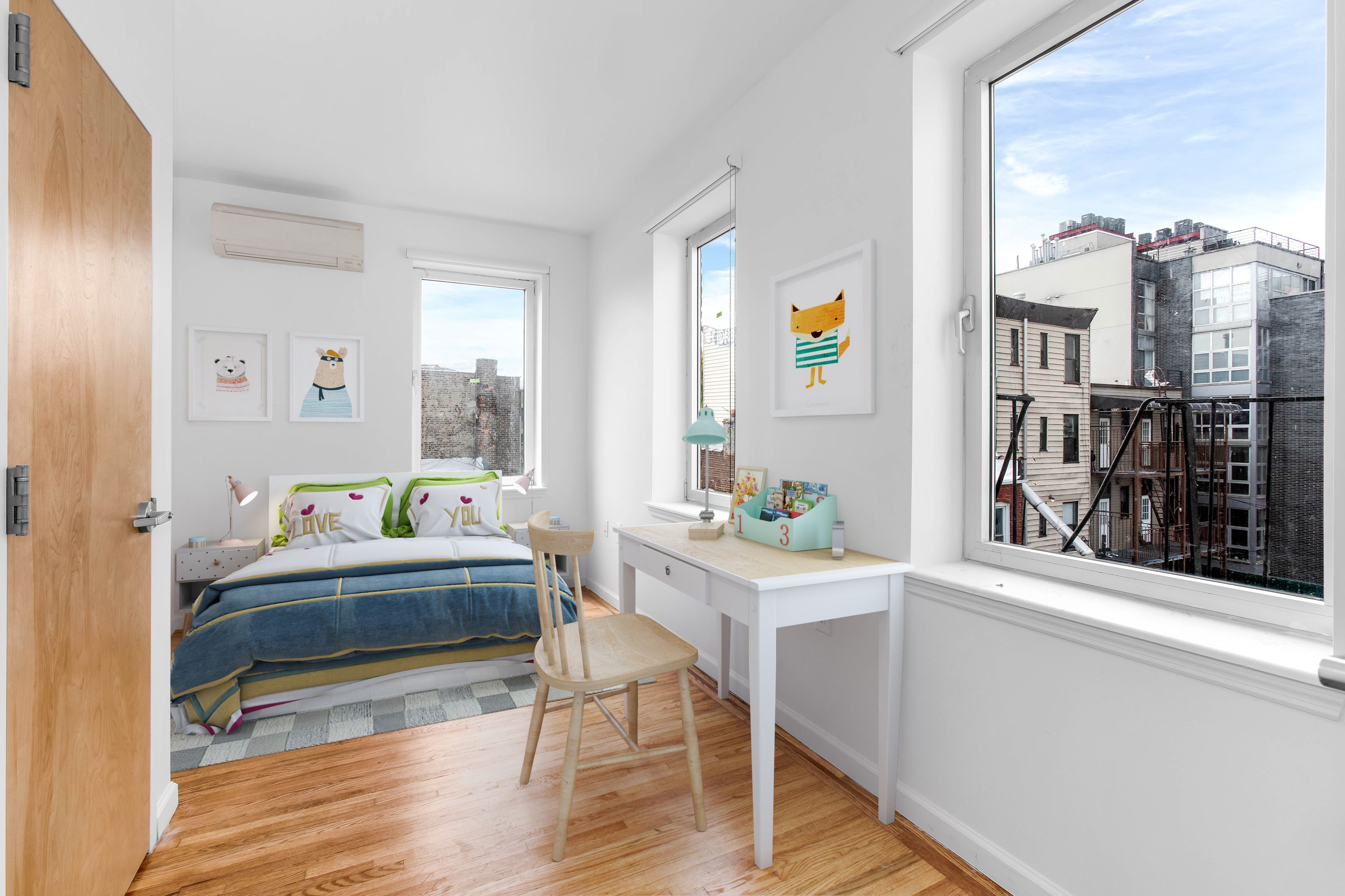 110 Bushwick Avenue, Unit 3 Brooklyn, NY 11206 - Photo 3 of 7 a workspace with furniture and window