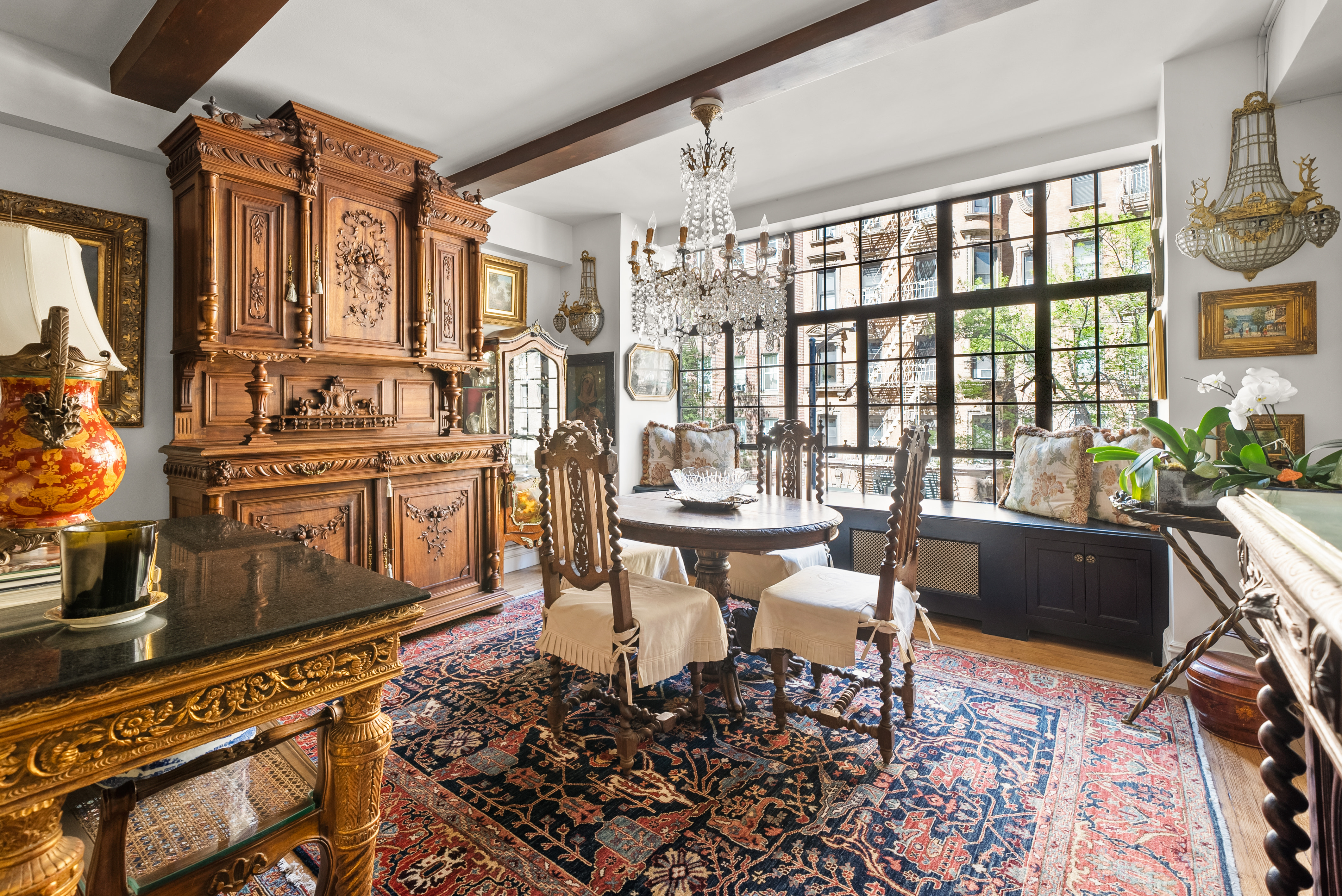230 East 50th Street, Unit 3B Manhattan, NY 10022 - Photo 3 of 21 a view of a dining room with furniture window and wooden floor