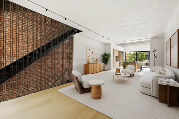 a living room with furniture and a rug