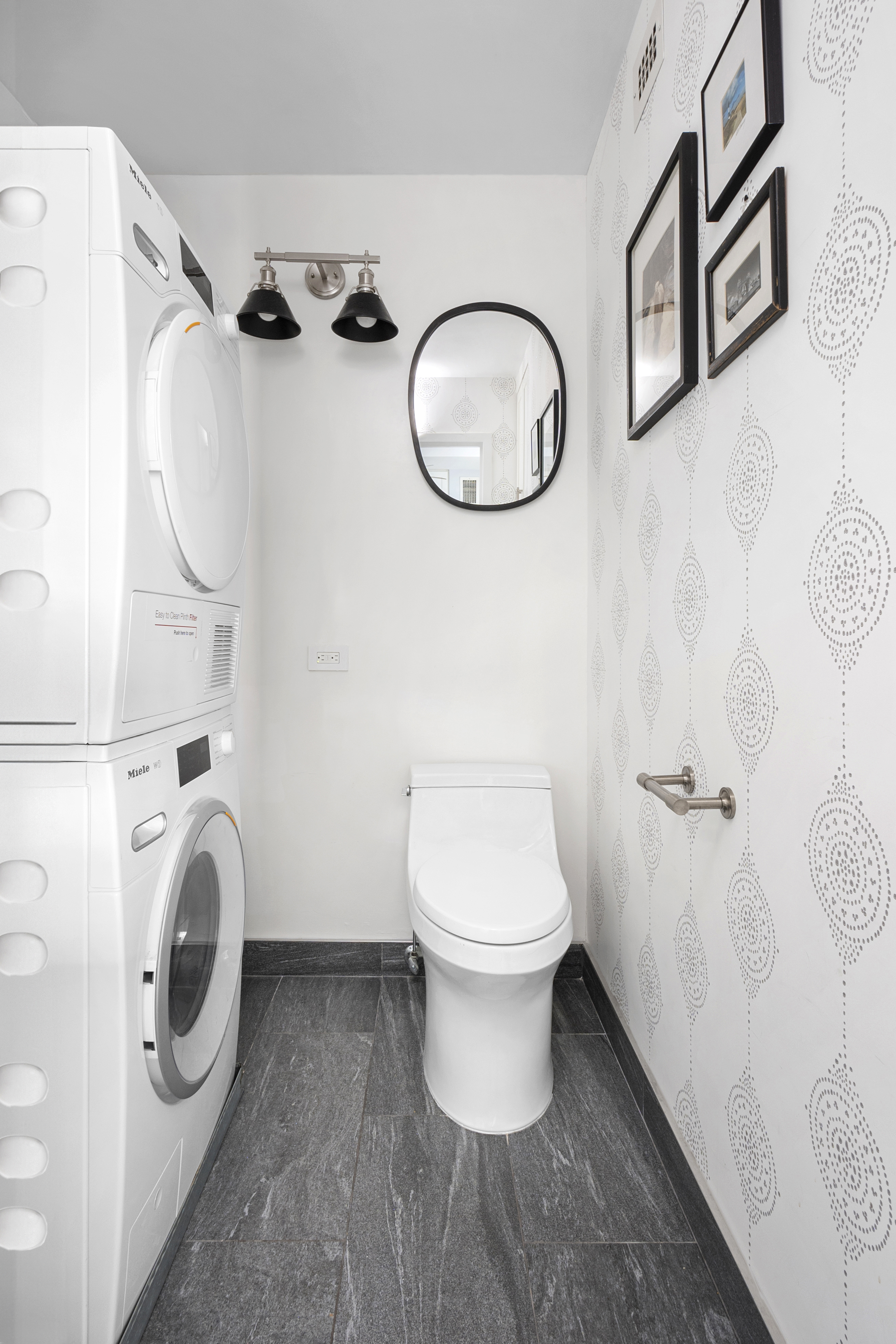 201 West 70th Street, Unit 16C Manhattan, NY 10023 - Photo 8 of 20 a bathroom with a toilet and a sink