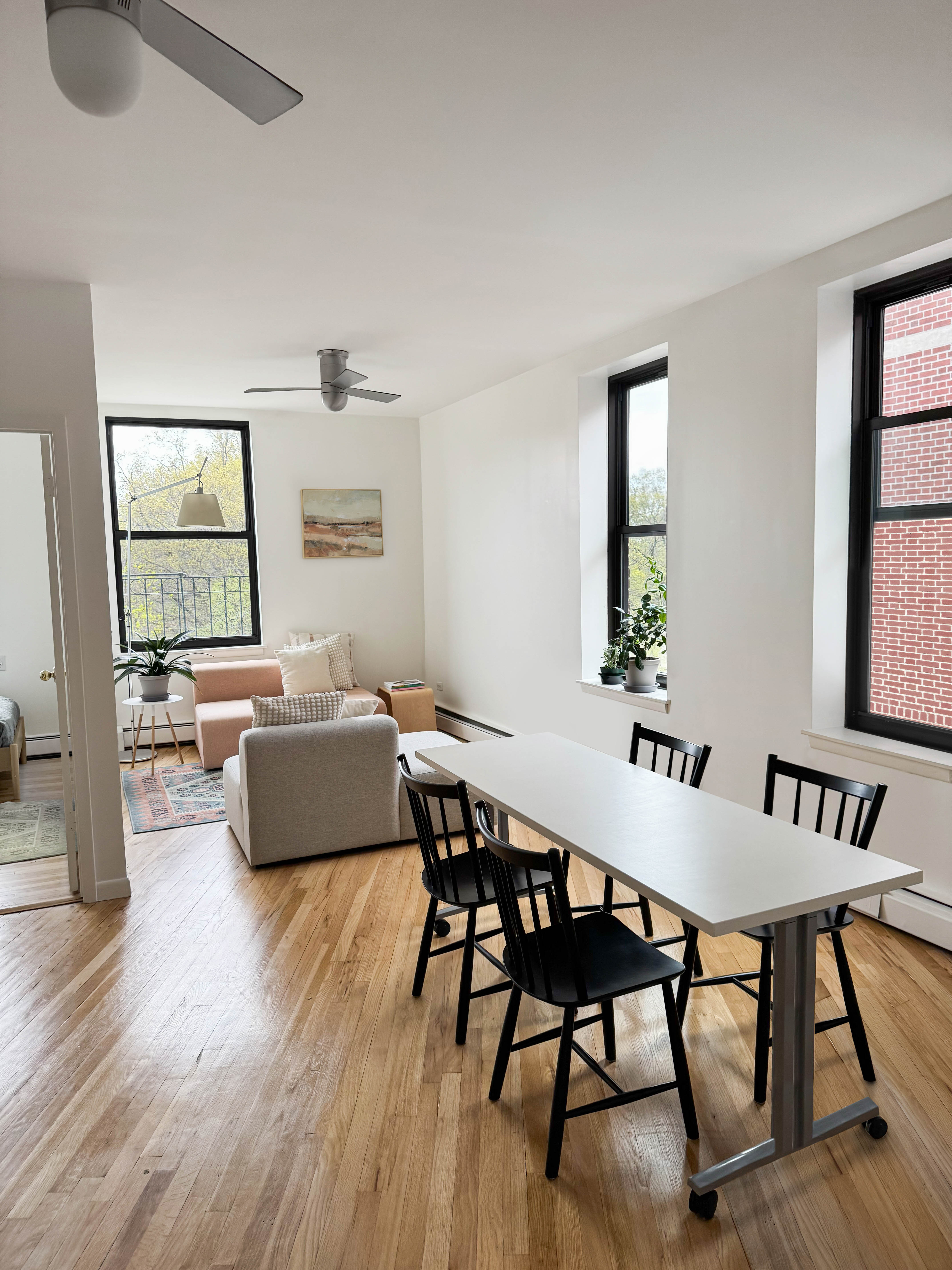 115 Eastern Parkway, Unit 6F Brooklyn, NY 11238 - Photo 2 of 11 a living room with furniture and a wooden floor