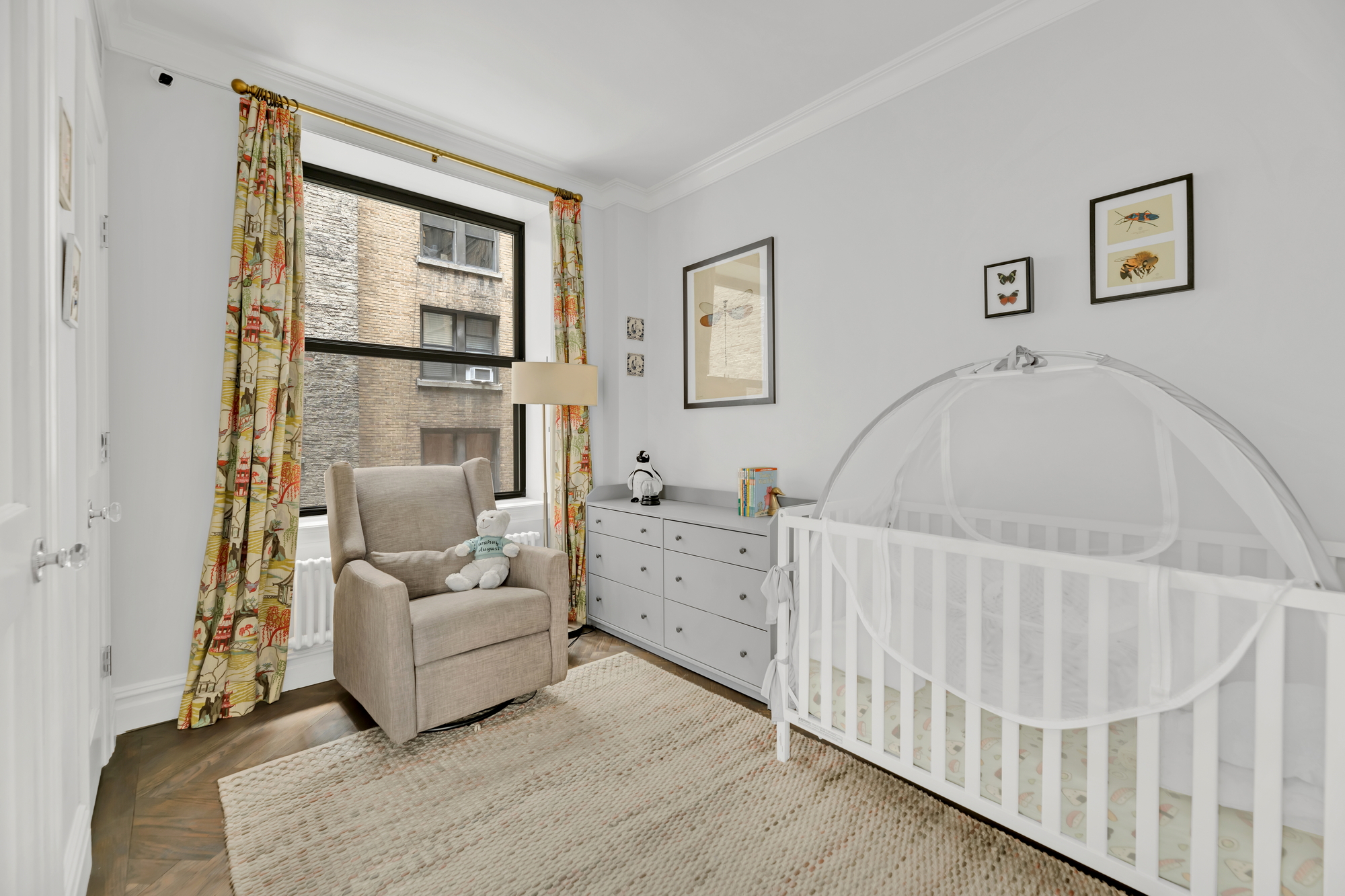 420 Riverside Drive, Unit 2G Manhattan, NY 10025 - Photo 10 of 20 a view of a bedroom with furniture window and wooden floor