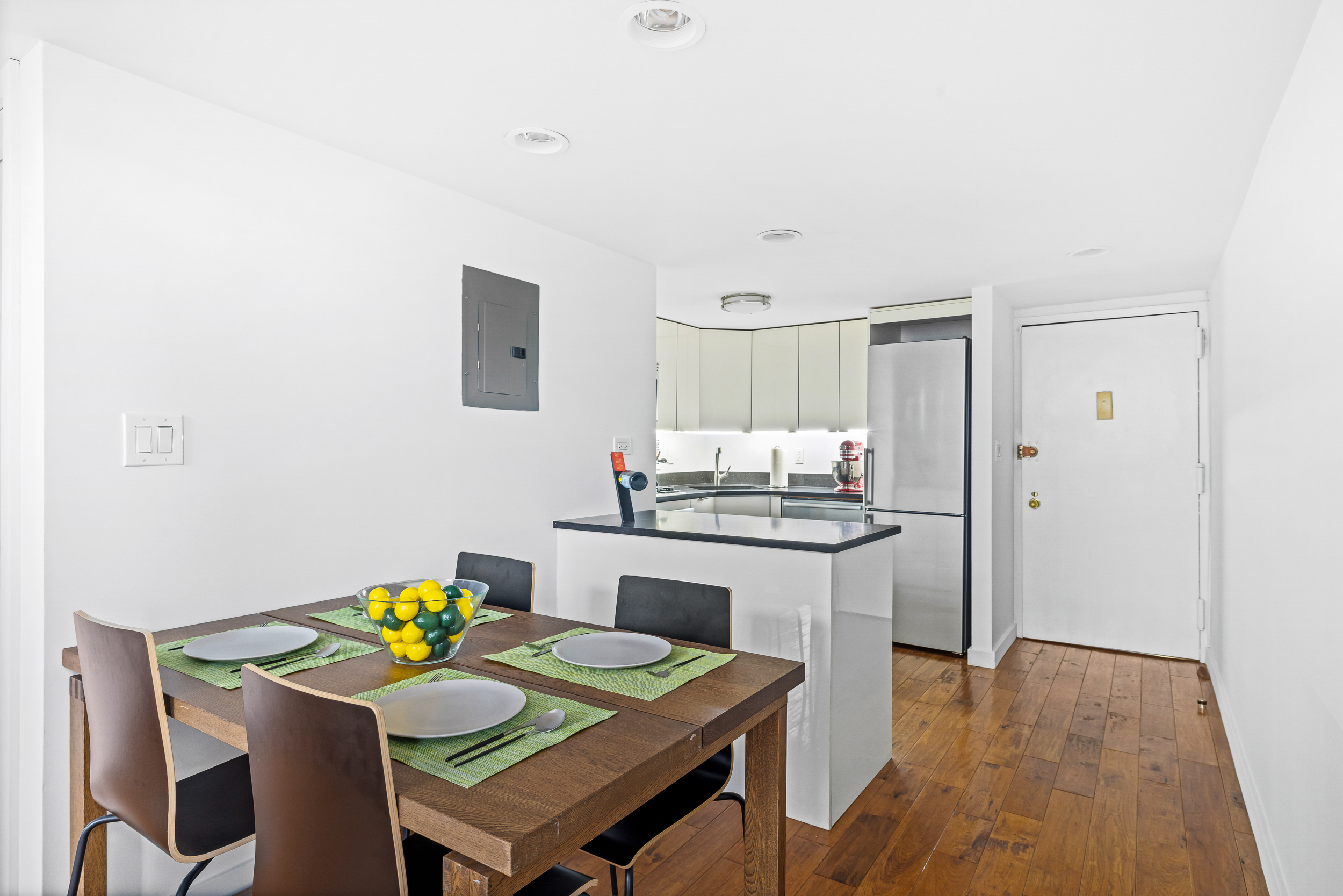 55 Poplar Street, Unit 6K Brooklyn, NY 11201 - Photo 5 of 15 a view of a dining room with furniture and wooden floor