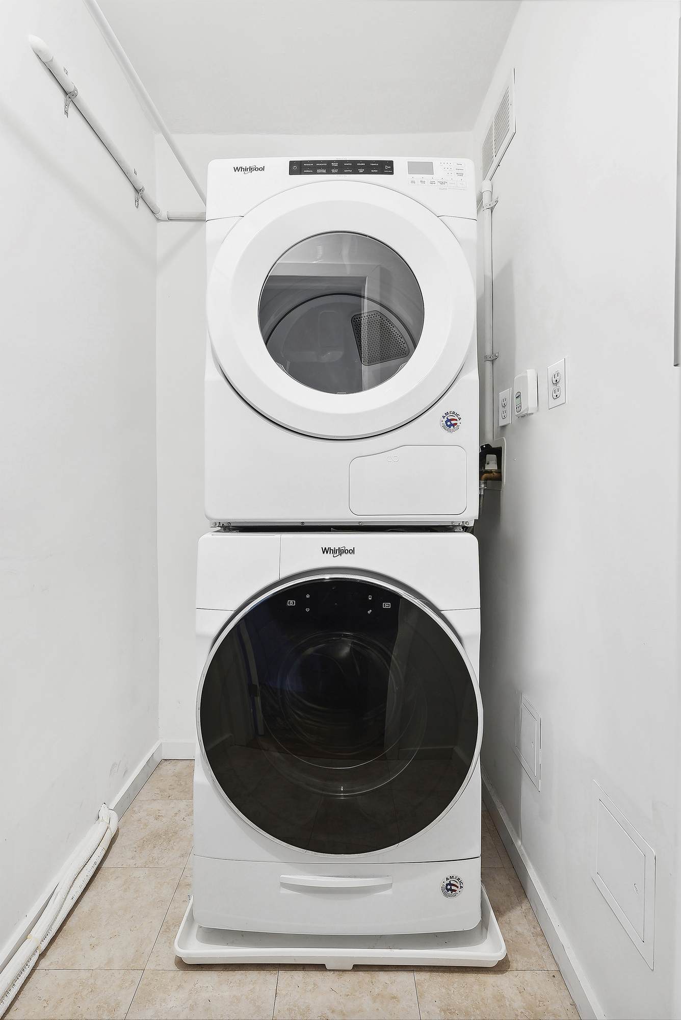 2 5th Avenue, Unit 2U Manhattan, NY 10011 - Photo 6 of 13 a close up view of a washer and dryer