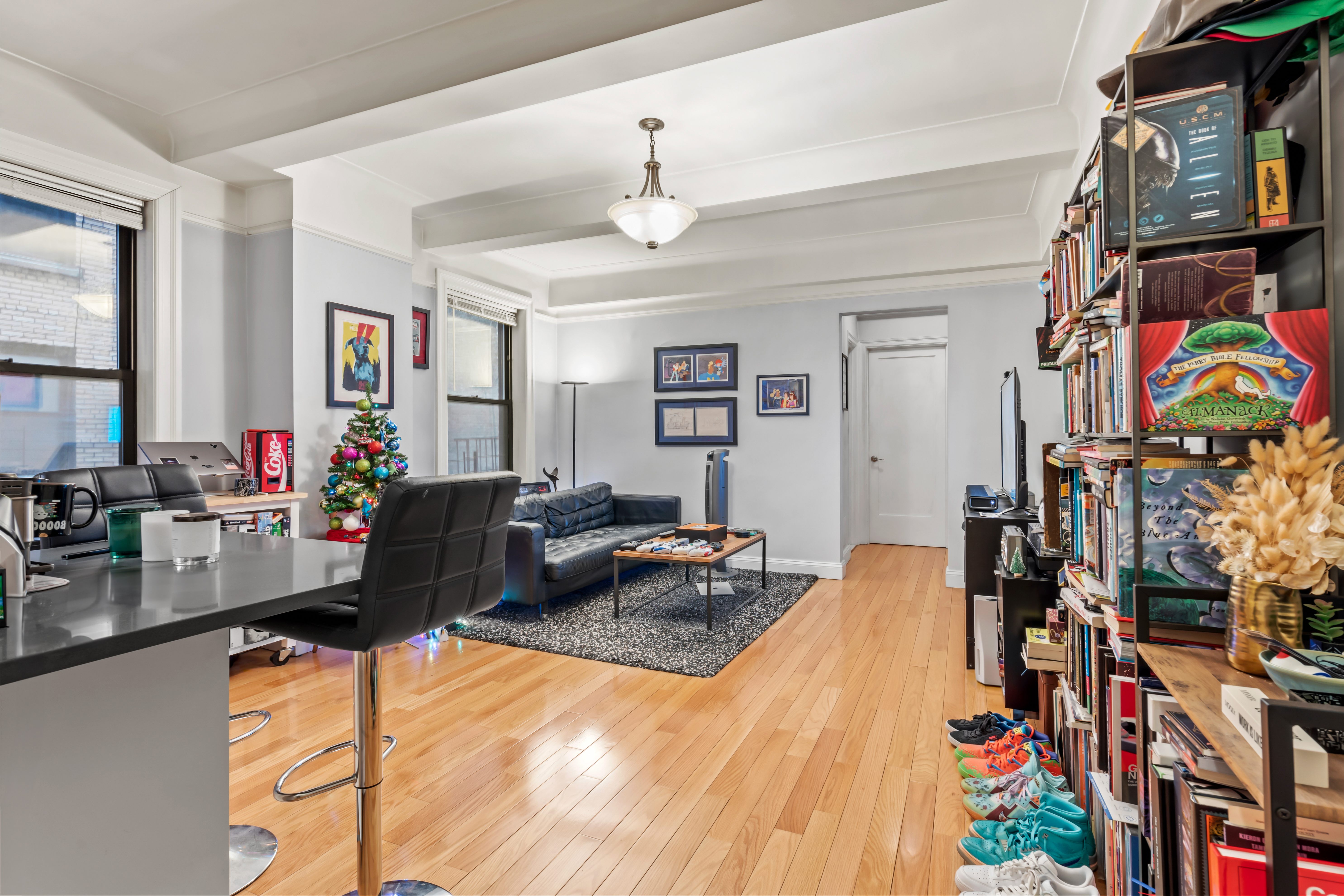 467 Central Park West, Unit 2G Manhattan, NY 10025 - Photo 4 of 10 a living room with patio furniture and a flat screen tv
