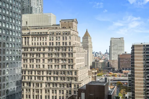 a view of a city with tall buildings