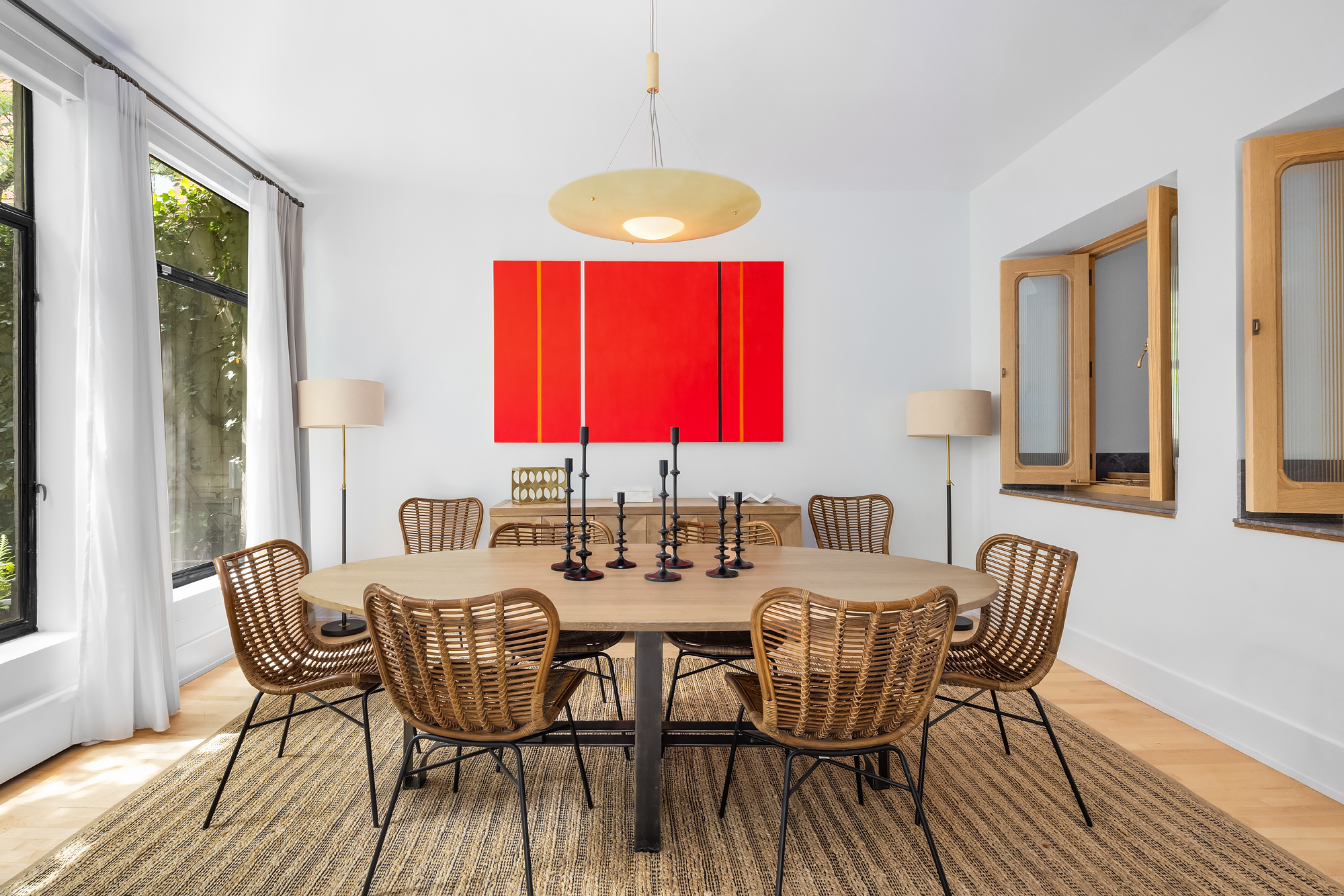 134 Charles Street Manhattan, NY 10014 - Photo 2 of 10 a view of a dining room with furniture and window