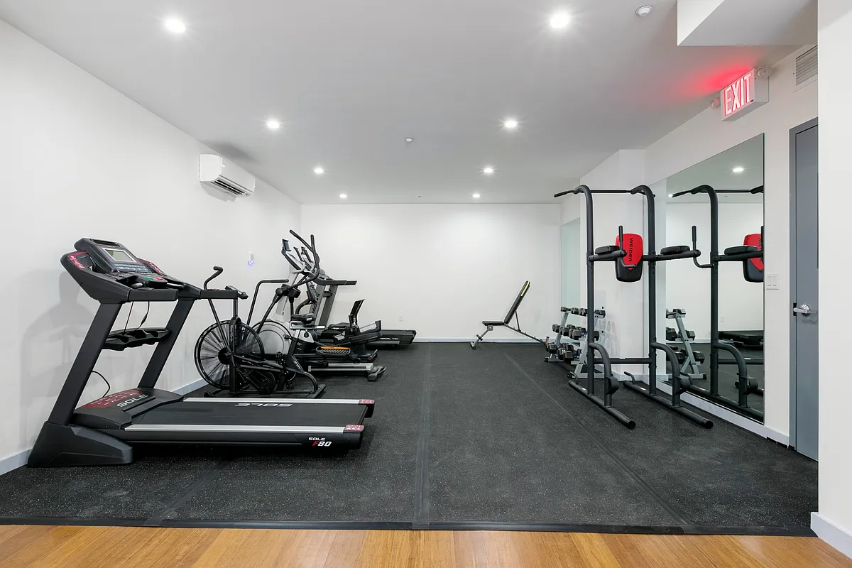 4907 4th Avenue, Unit 7A Brooklyn, NY 11220 - Photo 12 of 13 a view of a room with gym equipment