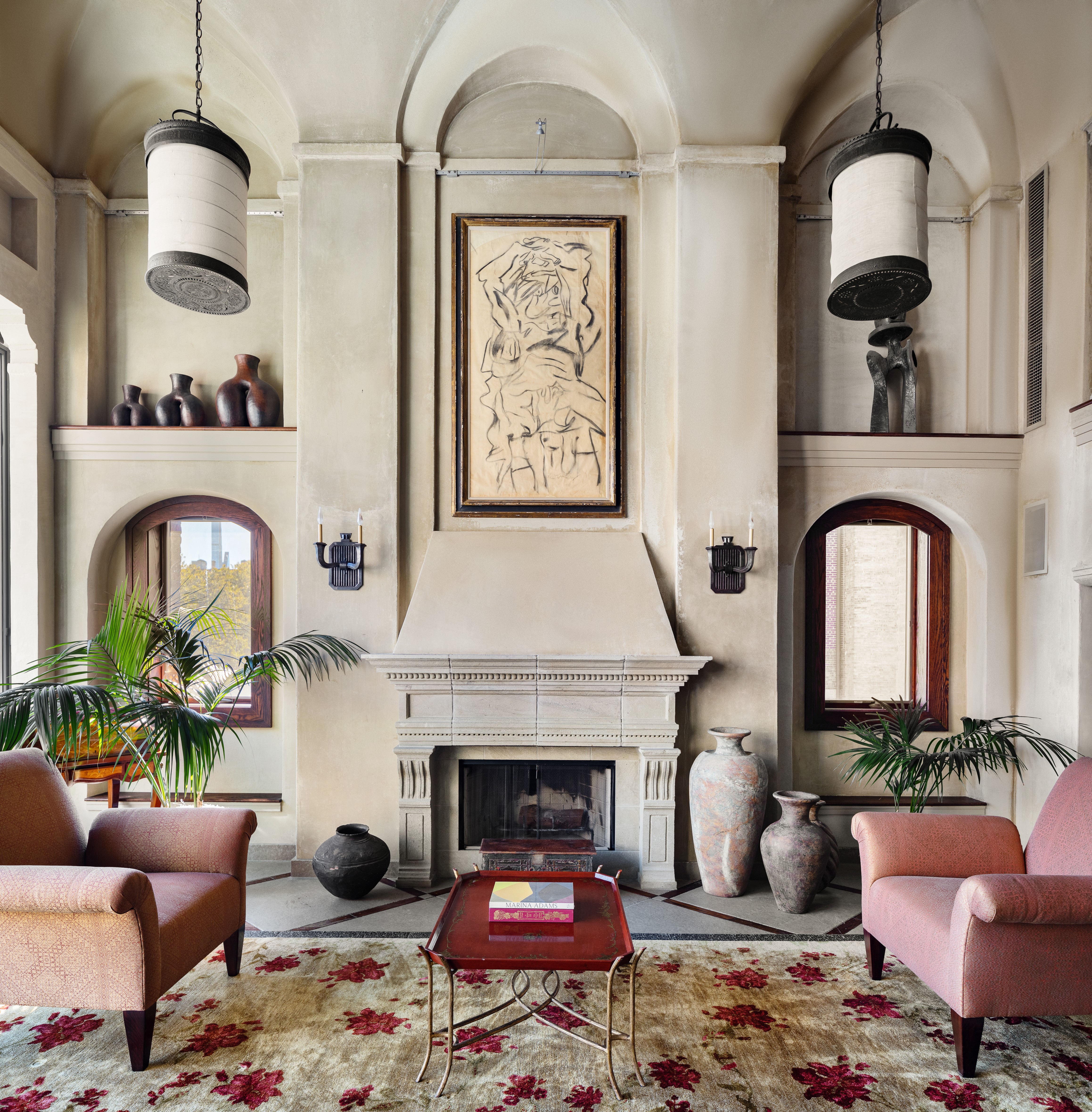 428 Columbus Avenue, Unit PH Manhattan, NY 10024 - Photo 5 of 21 a living room with furniture a fireplace and potted plants