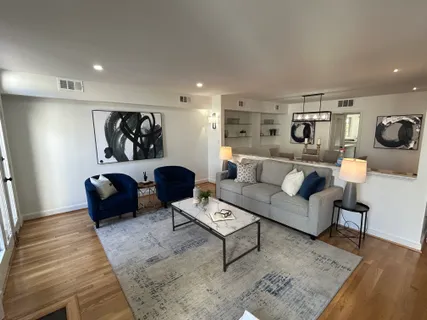 a living room with furniture and a couch