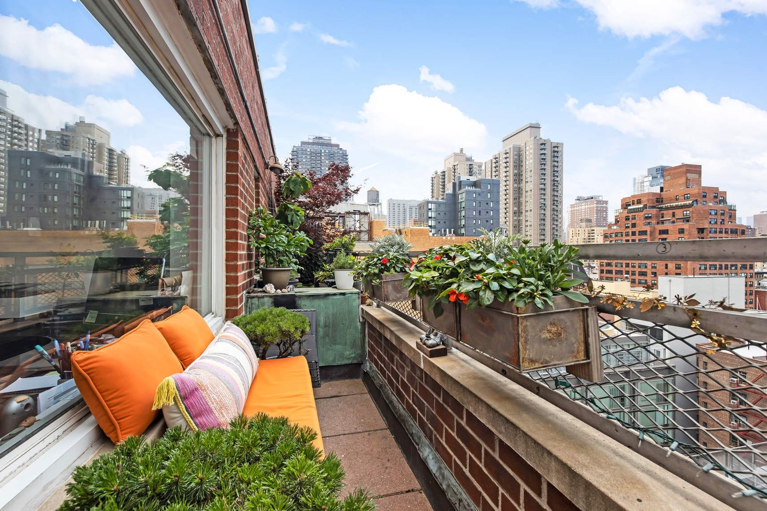 520 East 76th Street, Unit PHC Manhattan, NY 10021 - Photo 2 of 15 a outdoor view with a sitting space