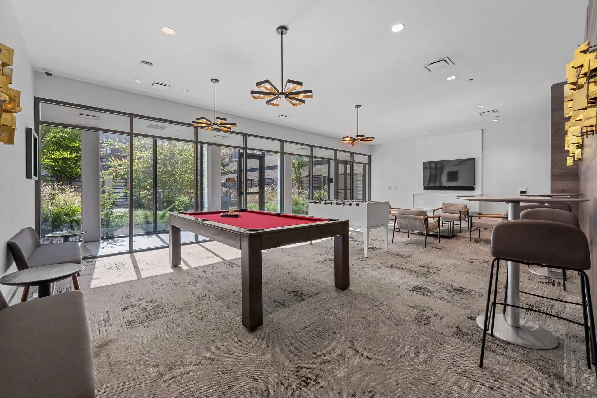 350 Clarkson Avenue, Unit 103 Brooklyn, NY 11226 - Photo 27 of 42 a living room with furniture a window and a flat screen tv