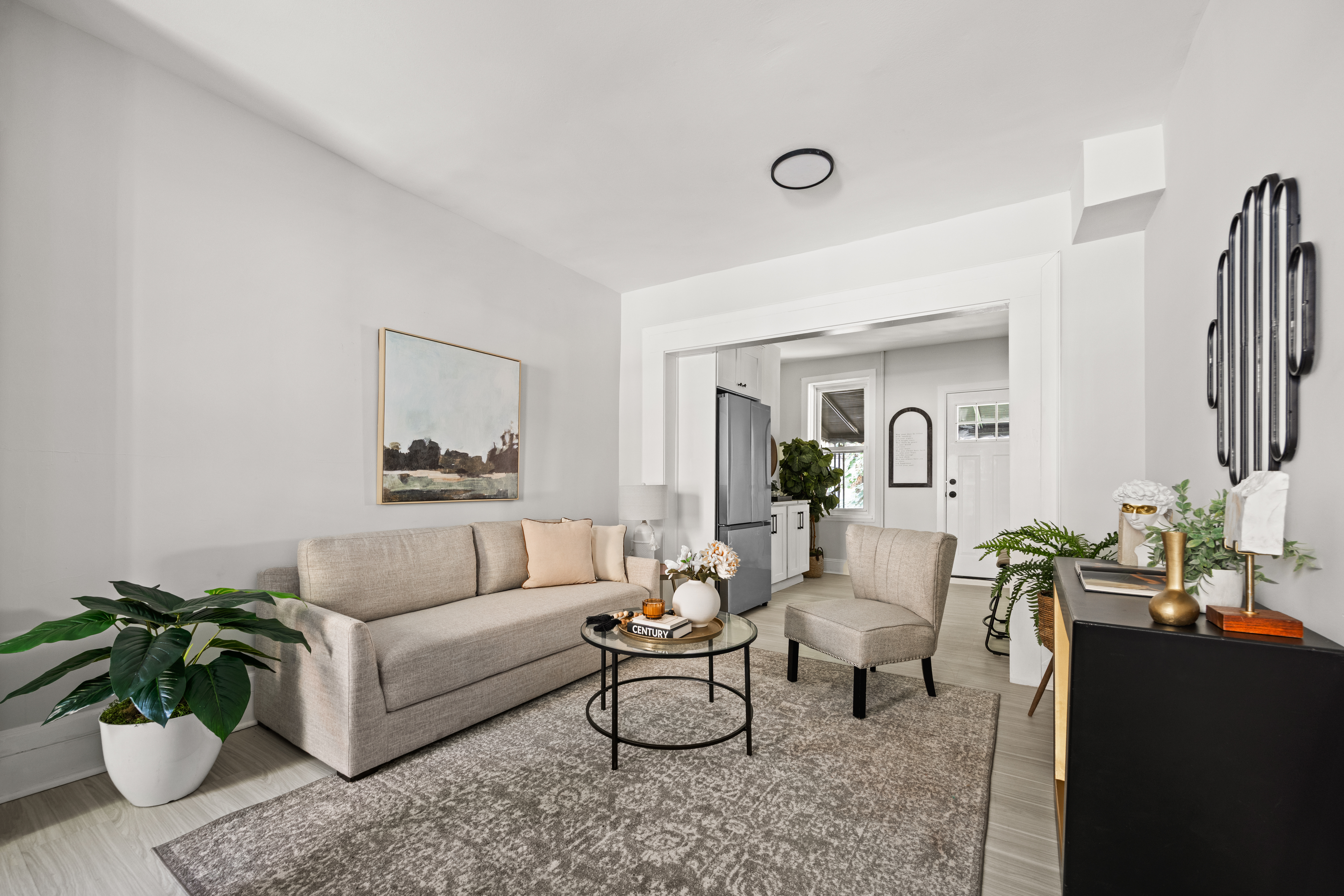 1588 Lincoln Place Brooklyn, NY 11233 - Photo 2 of 12 a living room with furniture potted plant and a window