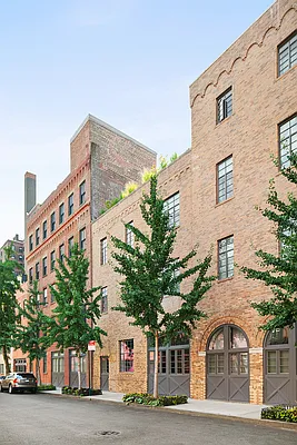 9 College Place, Unit 2K Brooklyn, NY 11201 - Photo 15 of 17 a front view of a building with a tree