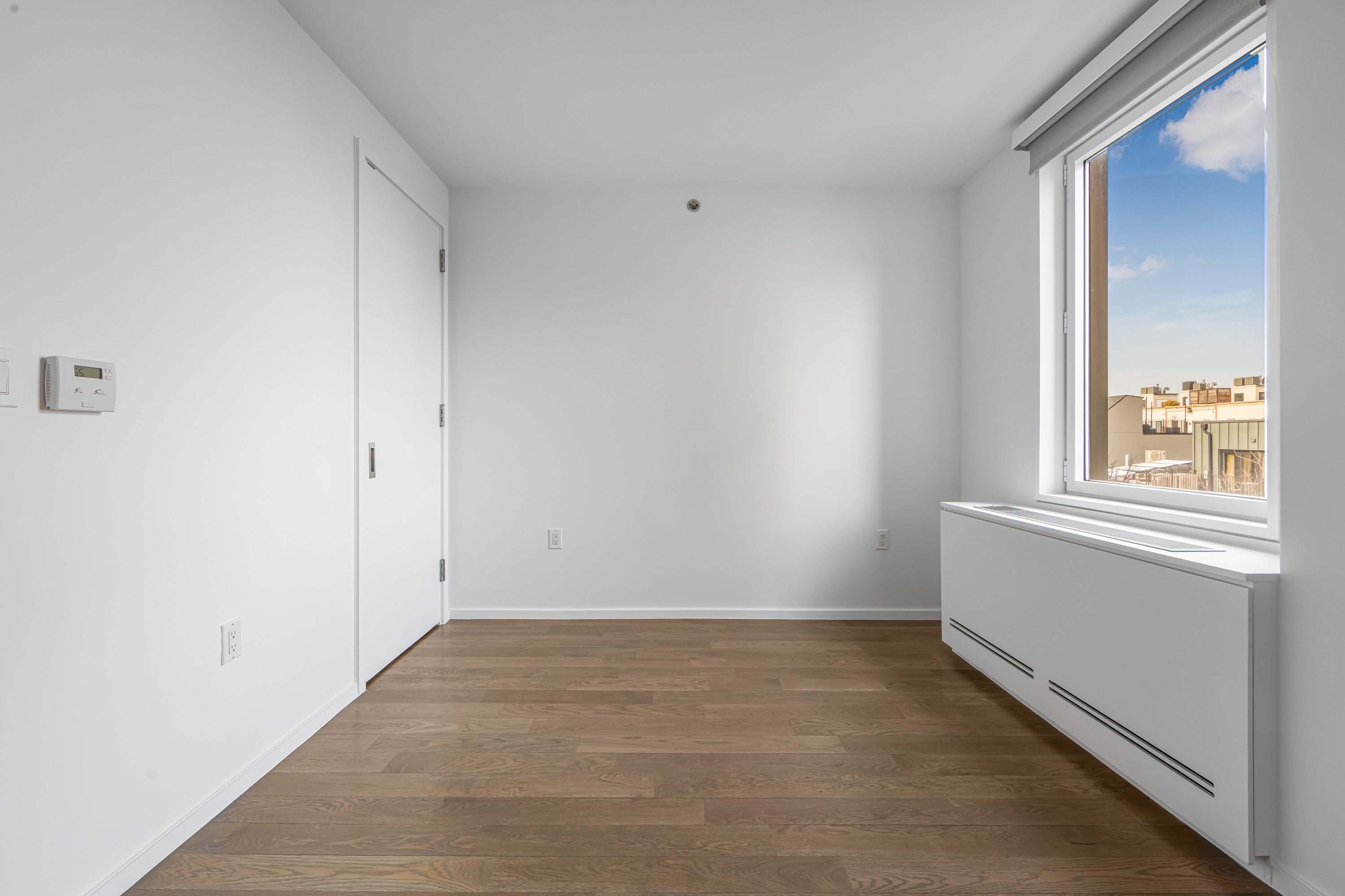 202 8th Street, Unit 4E Brooklyn, NY 11215 - Photo 6 of 19 a view of an empty room with a window