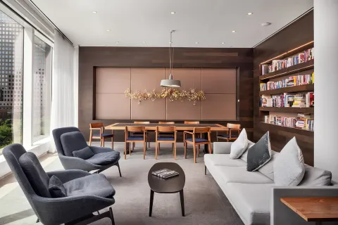 a room with lots of gym equipment and a large window