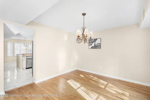 a view of empty room with a ceiling fan
