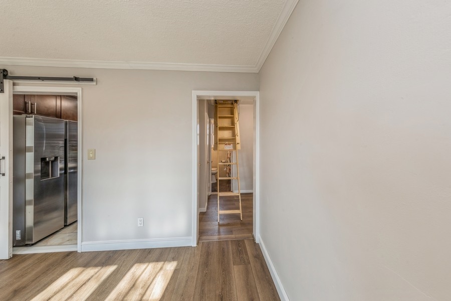 224-46 Horace Harding Expressway, Unit 630 Queens, NY 11364 - Photo 20 of 29 a view of wooden floor