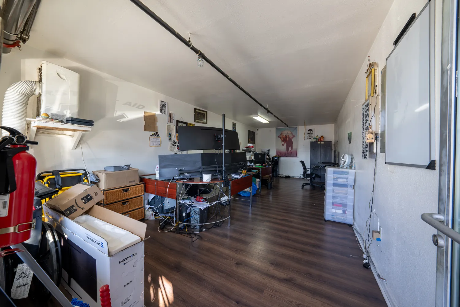 a room with furniture and a wooden floor