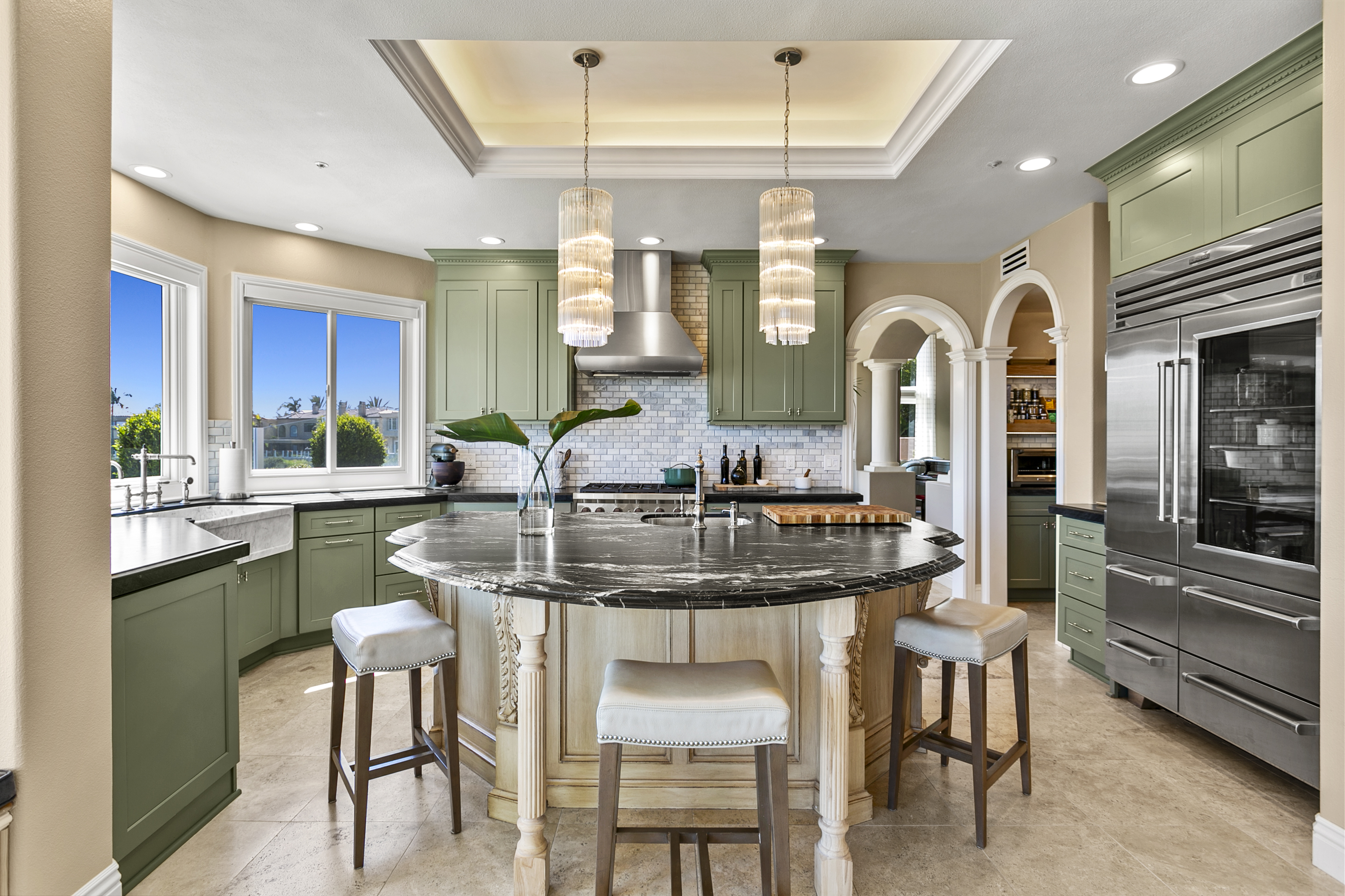 10 Vista Montemar Laguna Niguel, CA 92677 - Photo 32 of 67 a kitchen with center island table and chairs