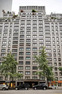 a front view of a building with a street