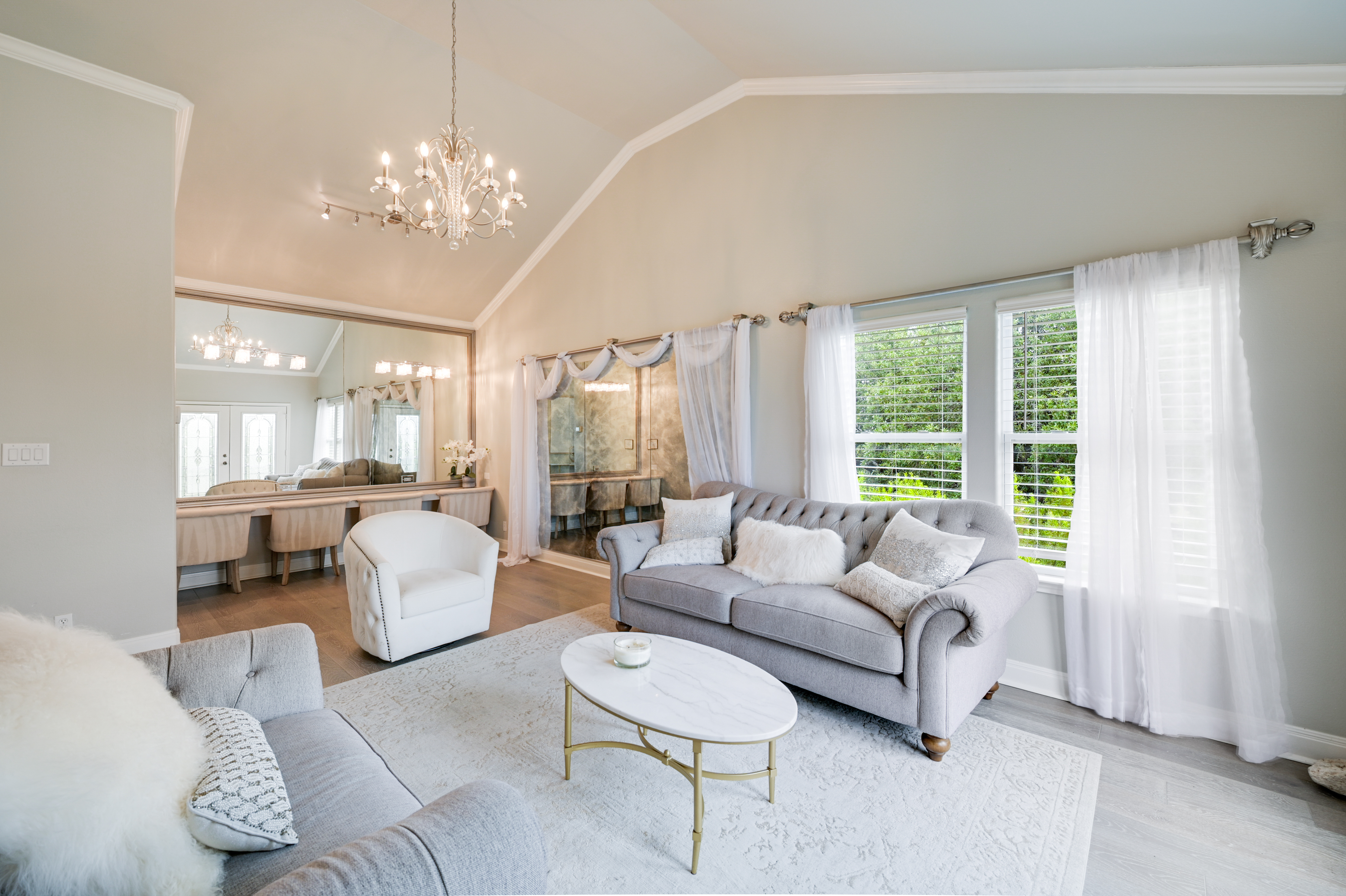 14913 Murfin Road Austin, TX 78734 - Photo 38 of 40 a living room with furniture and a chandelier