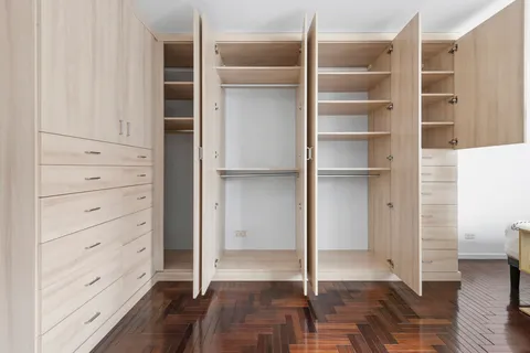 a view of an empty walk in closet