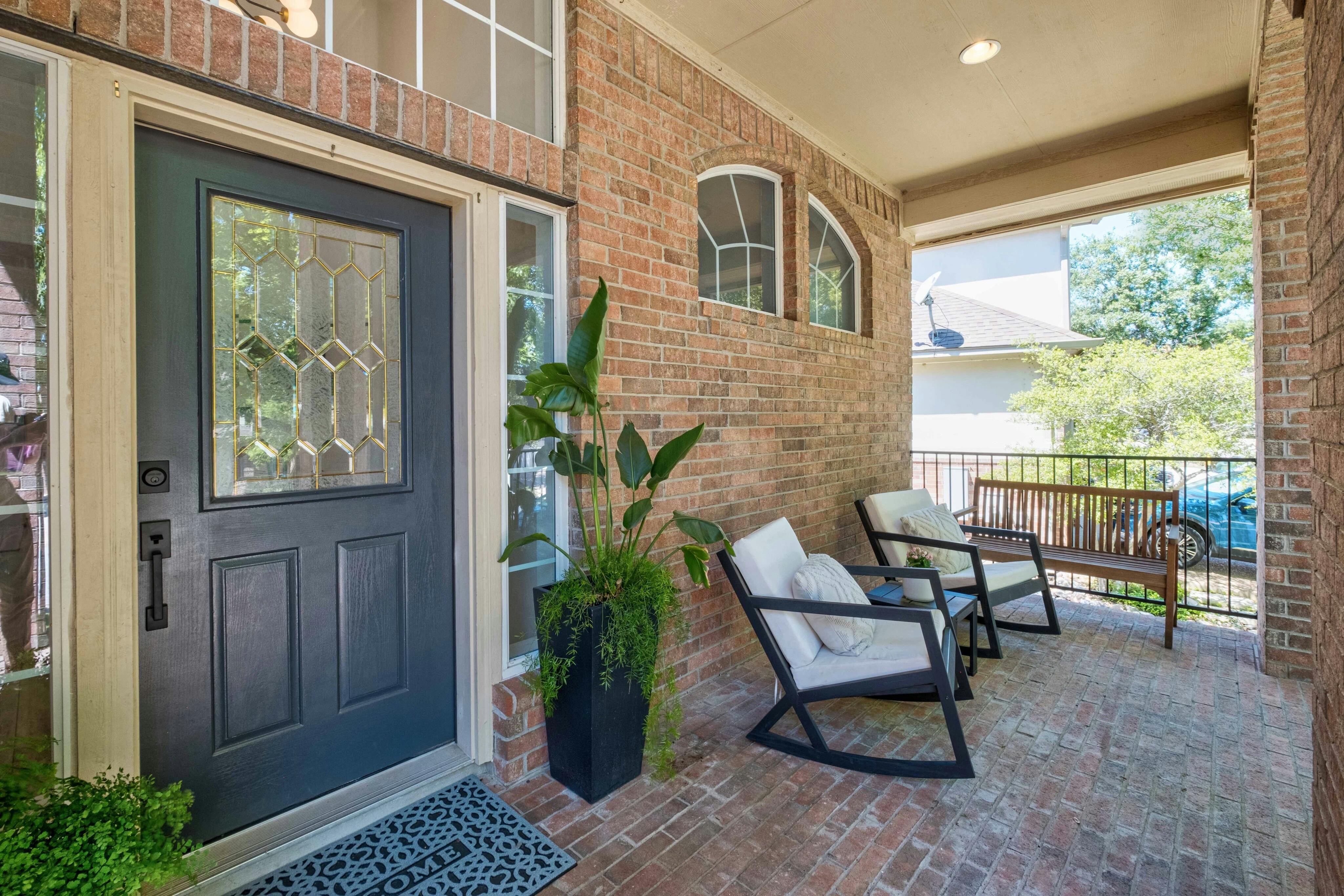 10608 Pointe View Drive Austin, TX 78738 - Photo 5 of 46 a view of a house with backyard and sitting area