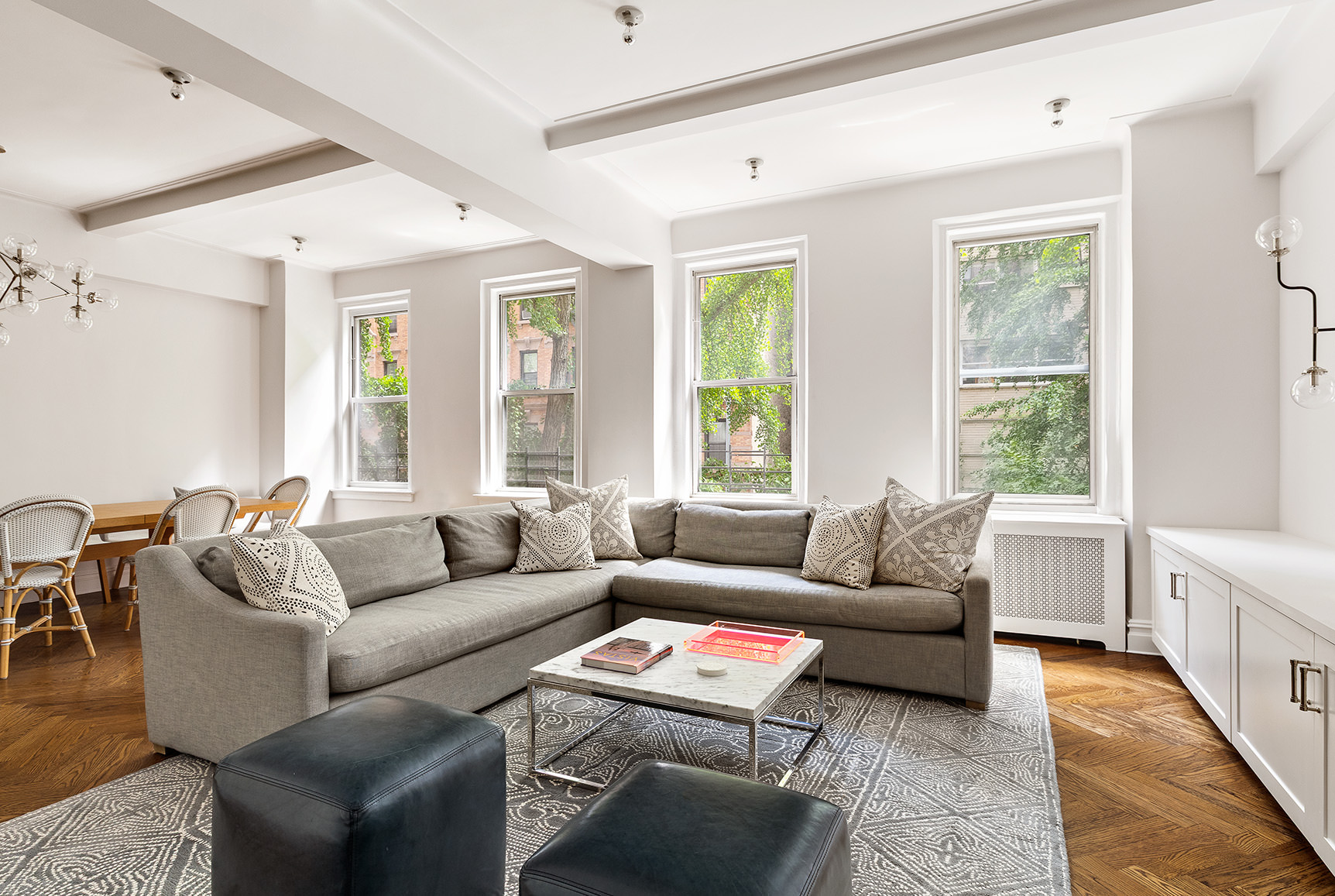 201 West 89th Street, Unit 2F Manhattan, NY 10024 - Photo 2 of 20 a living room with furniture and a large window